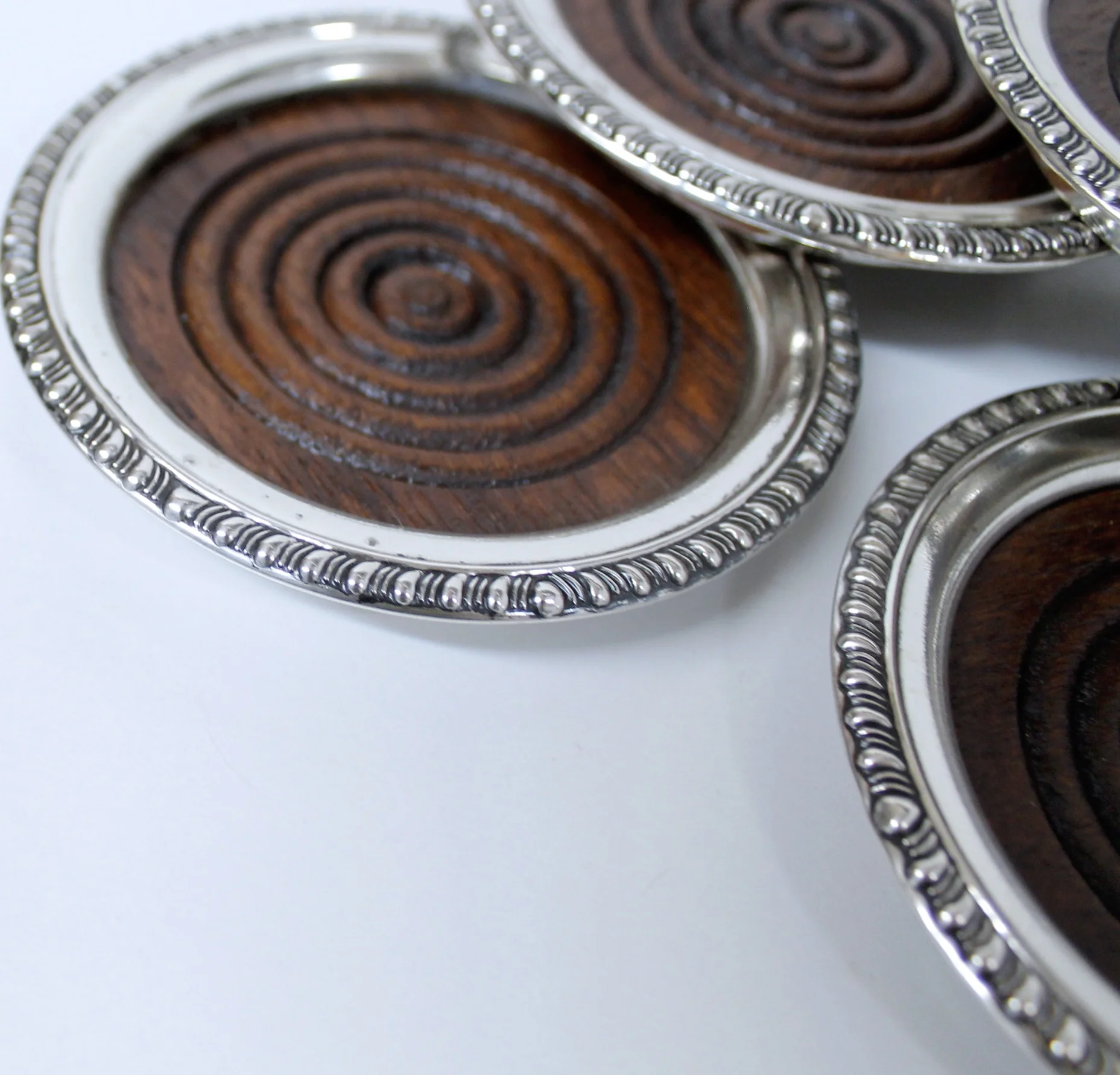 Sterling and Mahogany Coasters