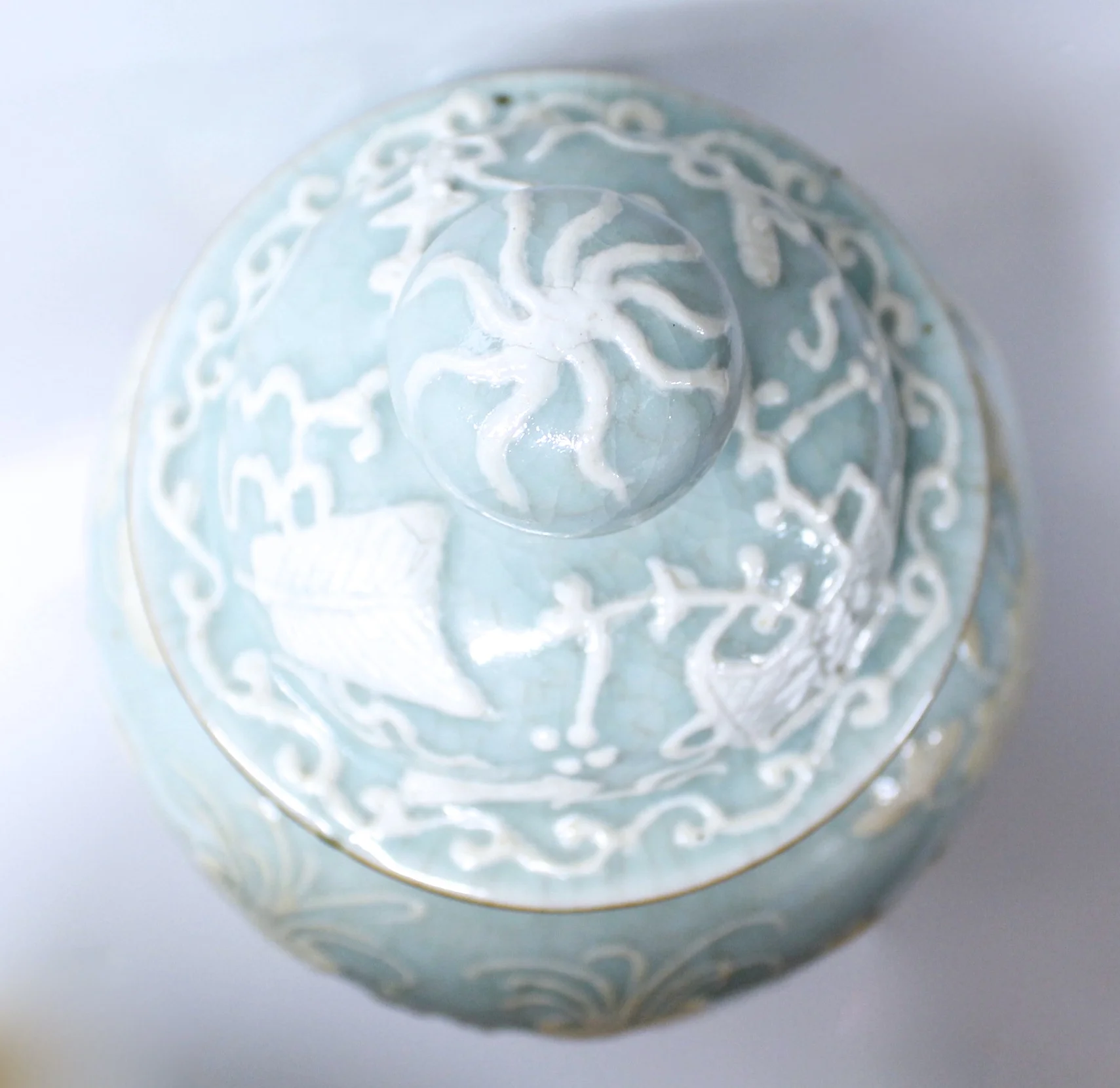 Pair of Chinese Celadon Porcelain Pâte sur Pâte Ginger Jars on Stands