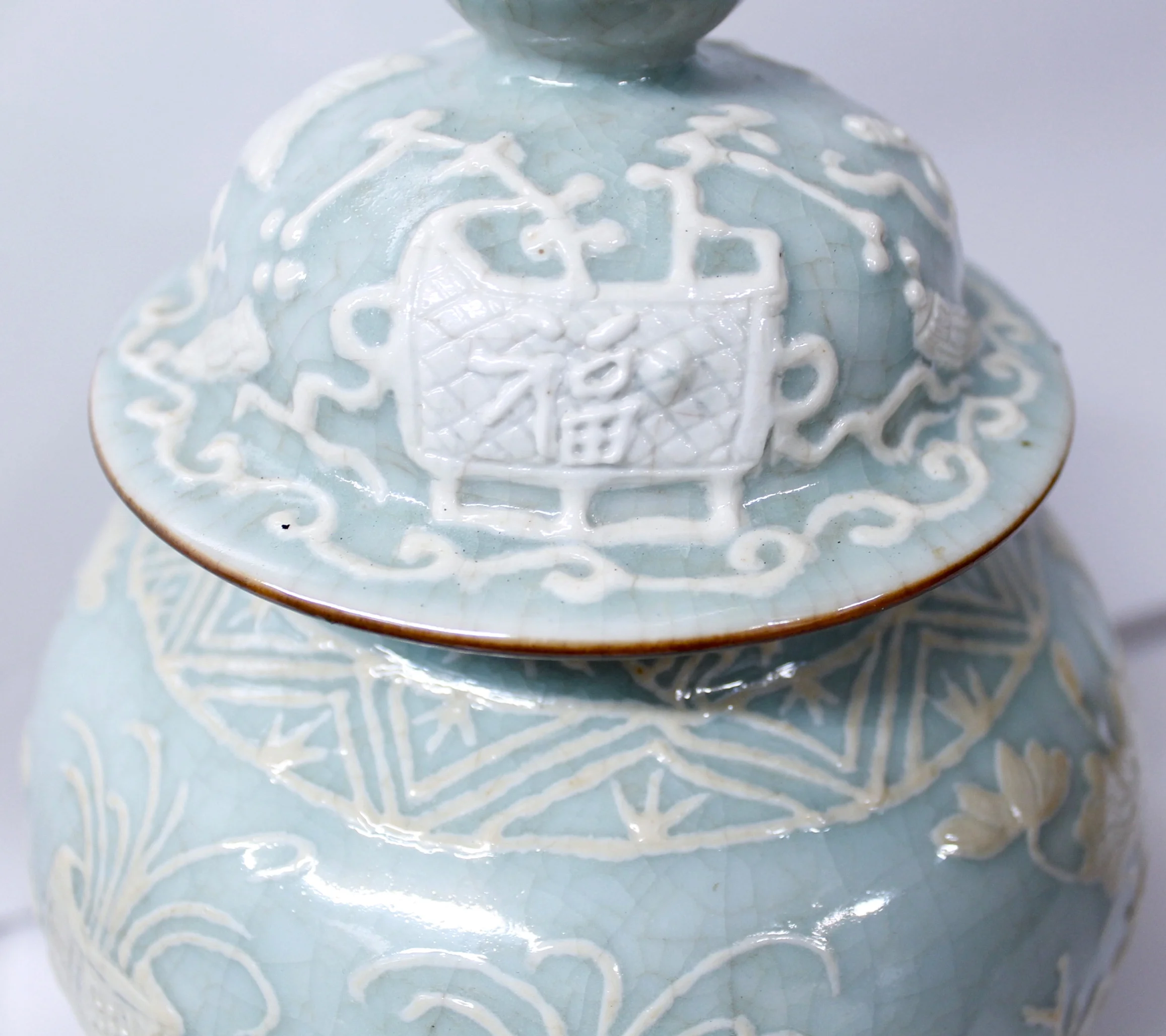 Pair of Chinese Celadon Porcelain Pâte sur Pâte Ginger Jars on Stands