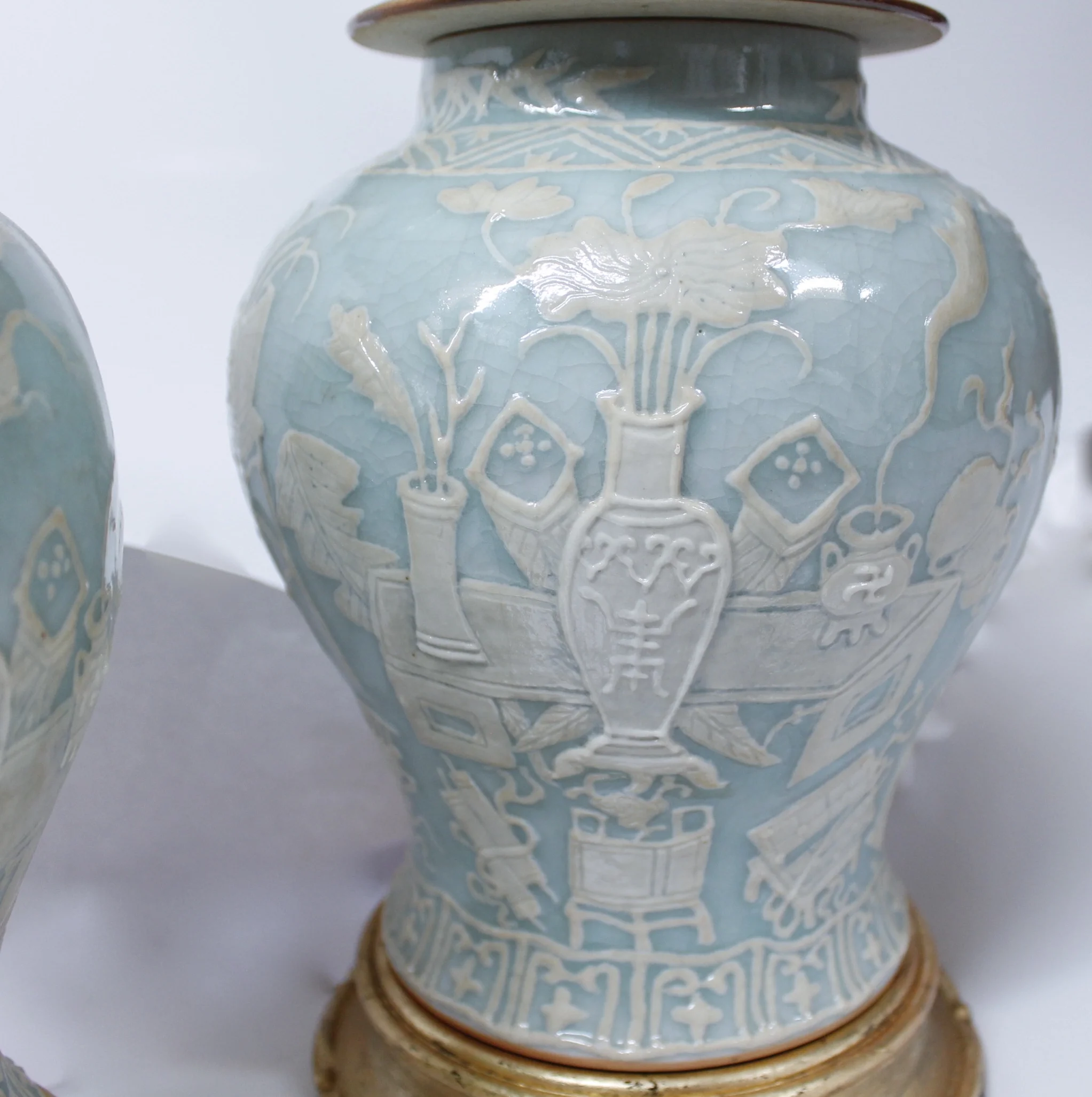 Pair of Chinese Celadon Porcelain Pâte sur Pâte Ginger Jars on Stands