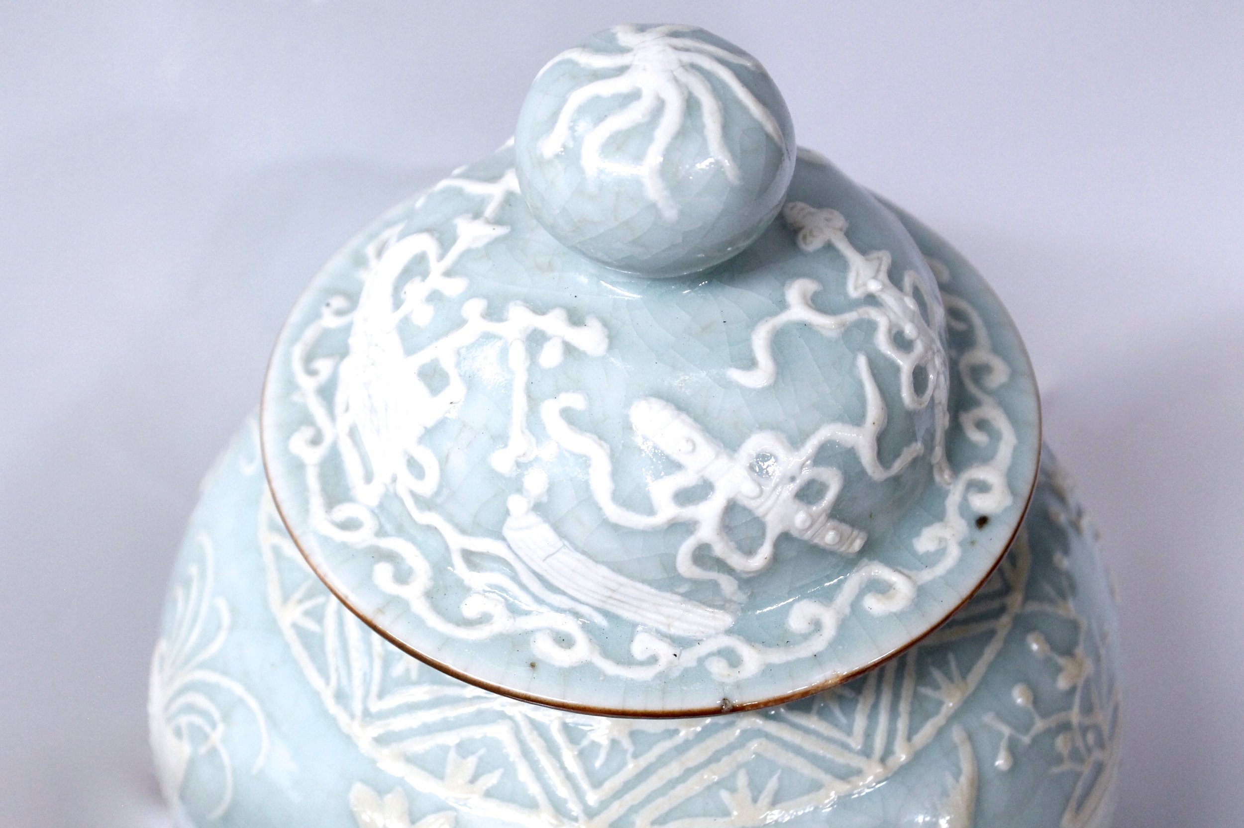 Pair of Chinese Celadon Porcelain Pâte sur Pâte Ginger Jars on Stands