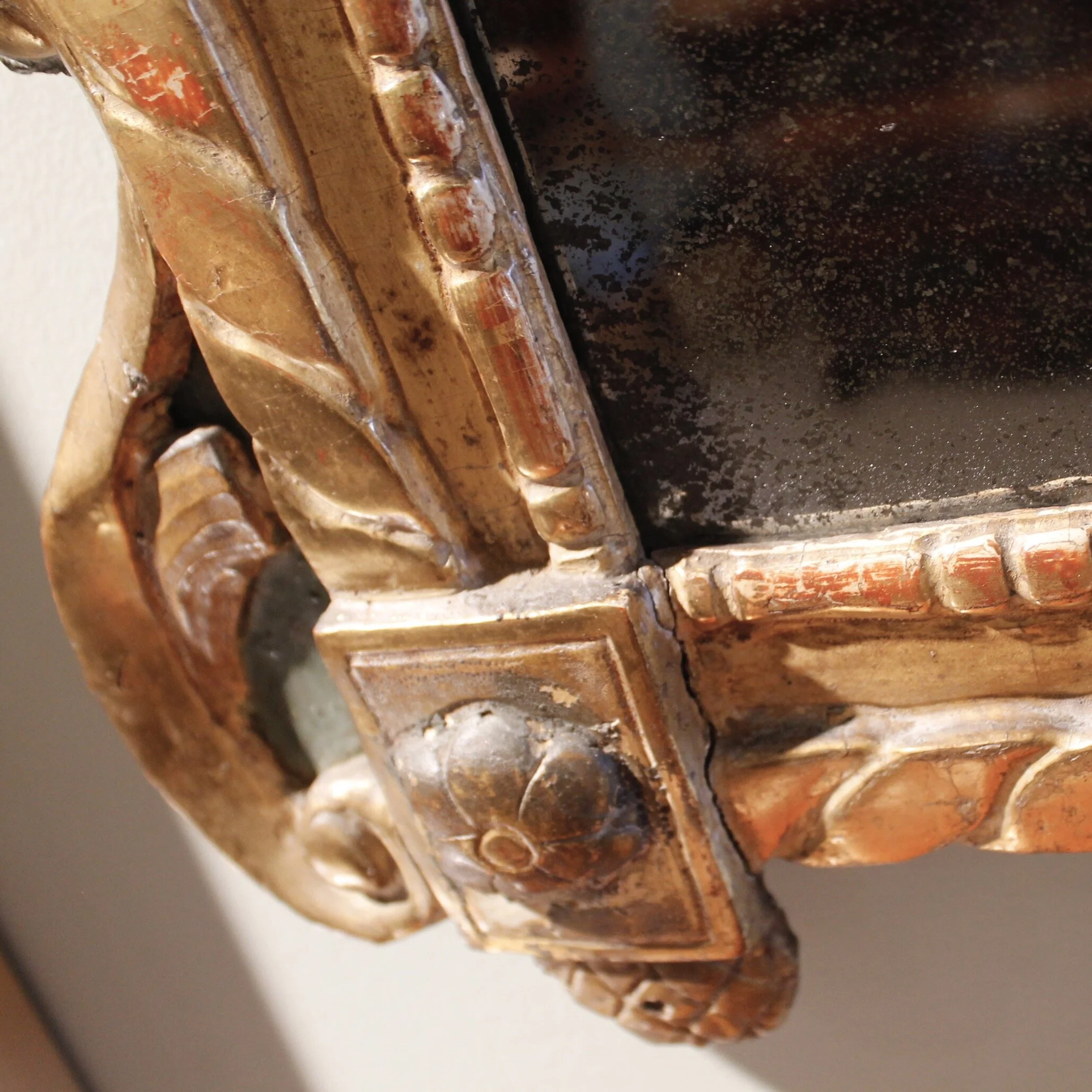 Early Louis XV Period Painted and Carved Giltwood Mirror