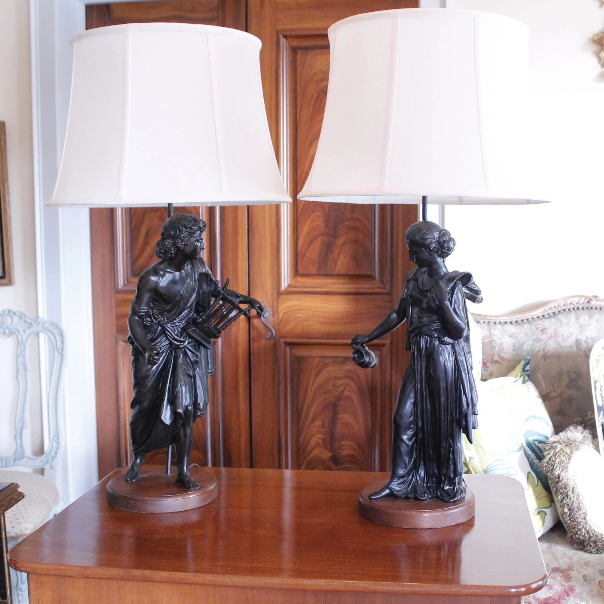 Pair of French Neoclassical Figure Lamps on Solid Walnut Plinths
