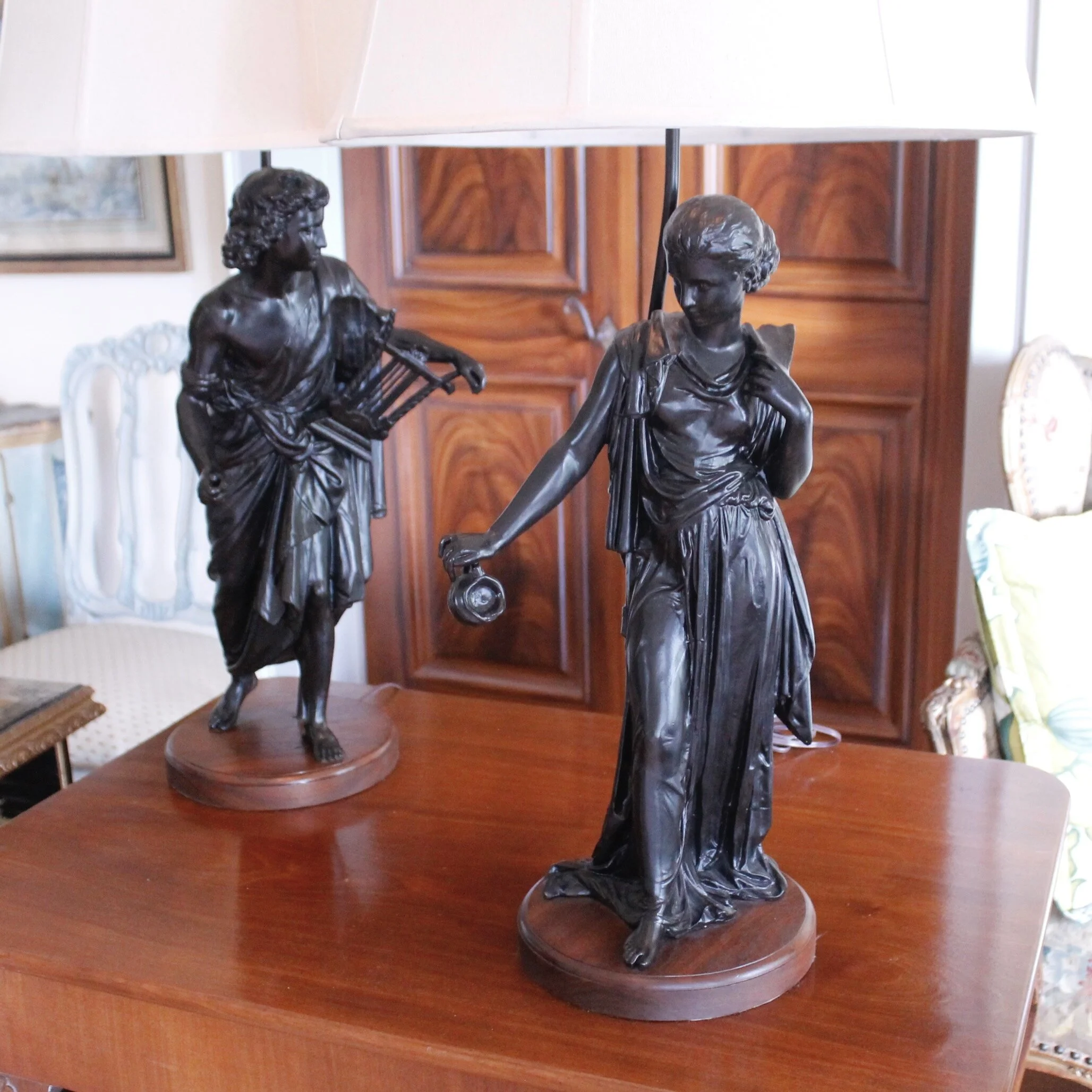 Pair of French Neoclassical Figure Lamps on Solid Walnut Plinths