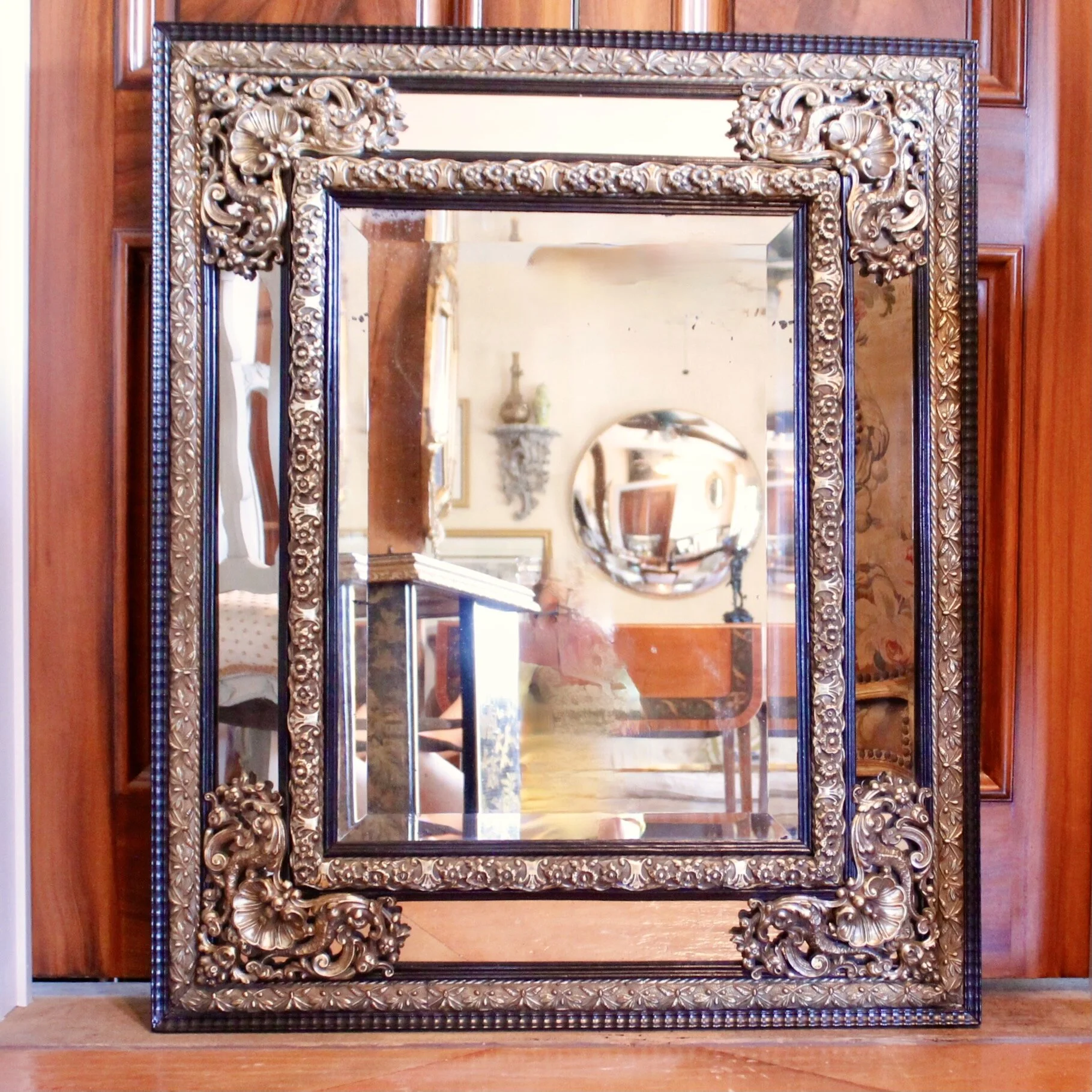 Continental Baroque Style Cushion Mirror with Brass Repoussé Mounts