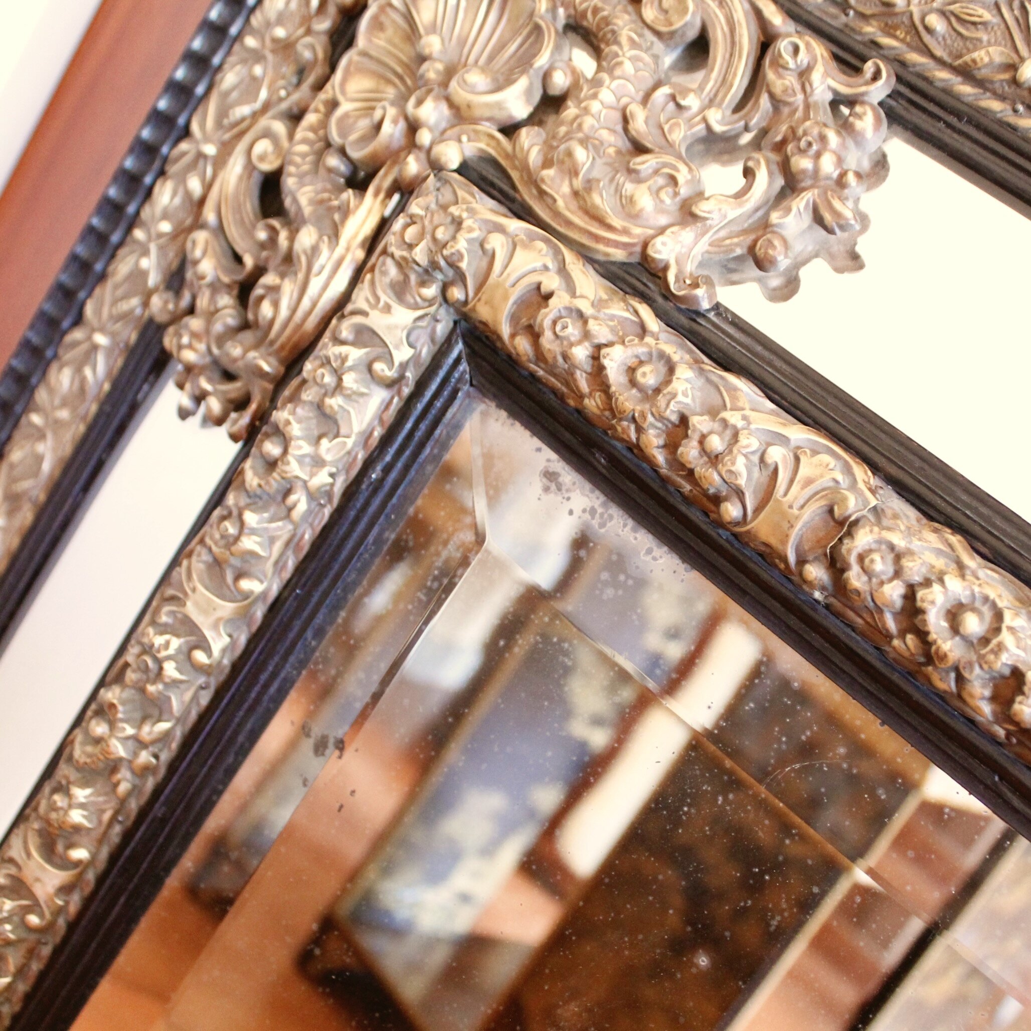 Continental Baroque Style Cushion Mirror with Brass Repoussé Mounts