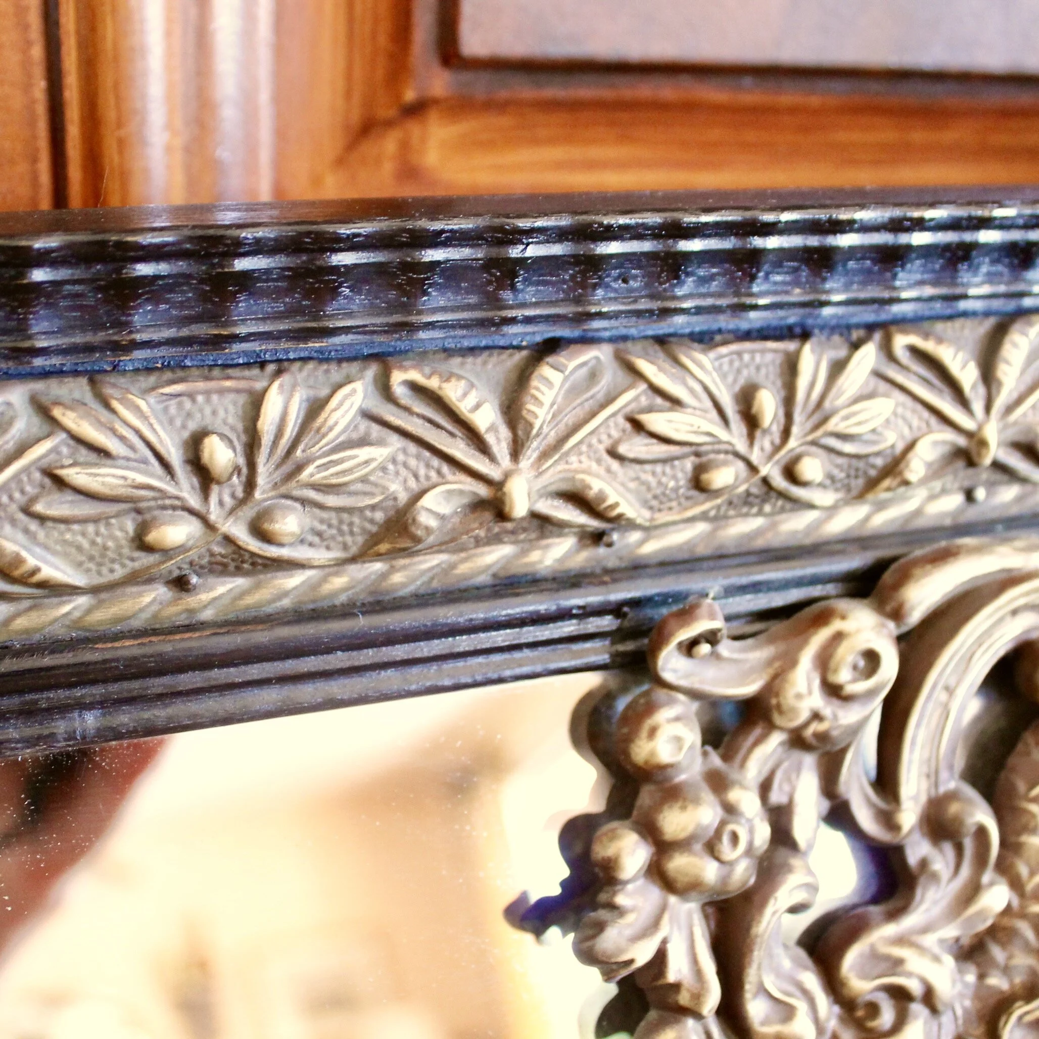 Continental Baroque Style Cushion Mirror with Brass Repoussé Mounts