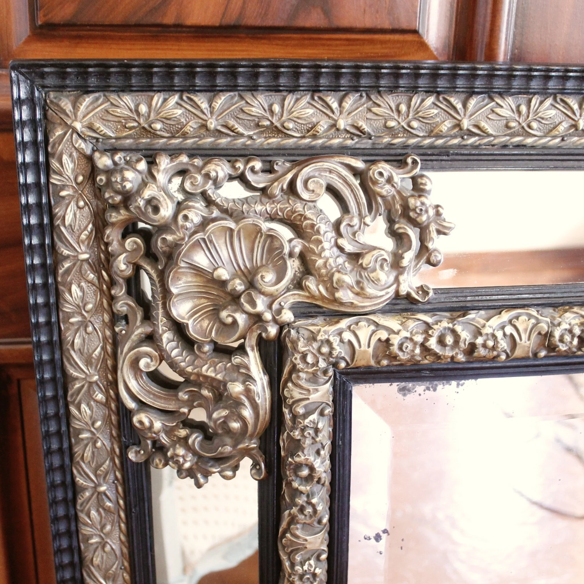 Continental Baroque Style Cushion Mirror with Brass Repoussé Mounts