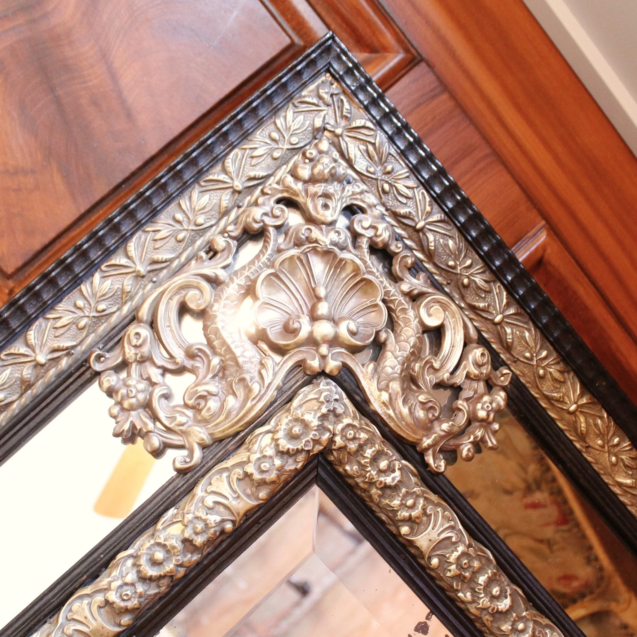Continental Baroque Style Cushion Mirror with Brass Repoussé Mounts