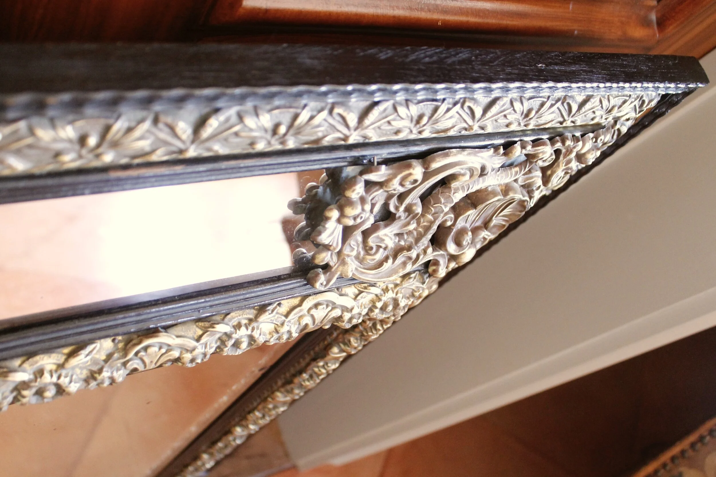 Continental Baroque Style Cushion Mirror with Brass Repoussé Mounts