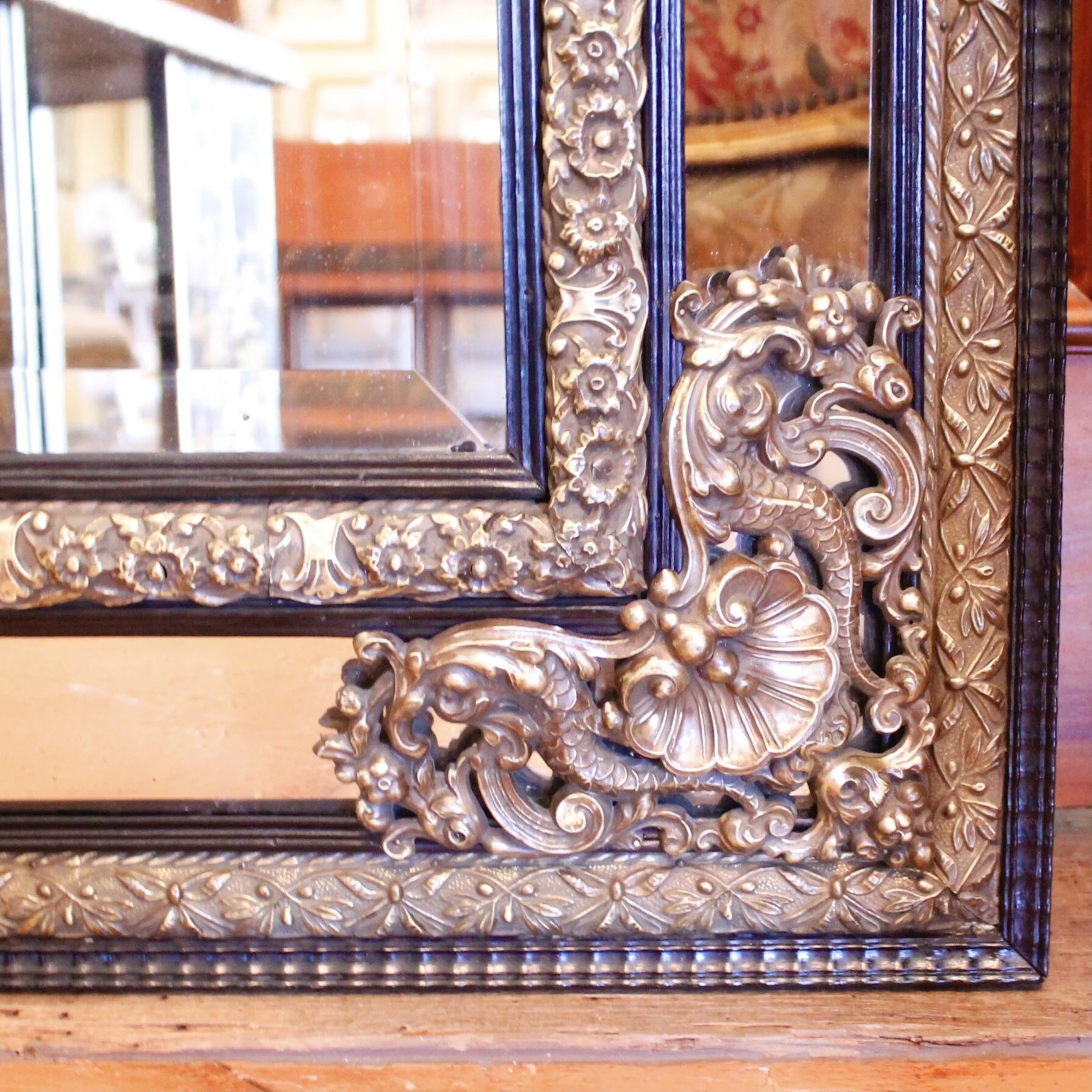 Continental Baroque Style Cushion Mirror with Brass Repoussé Mounts