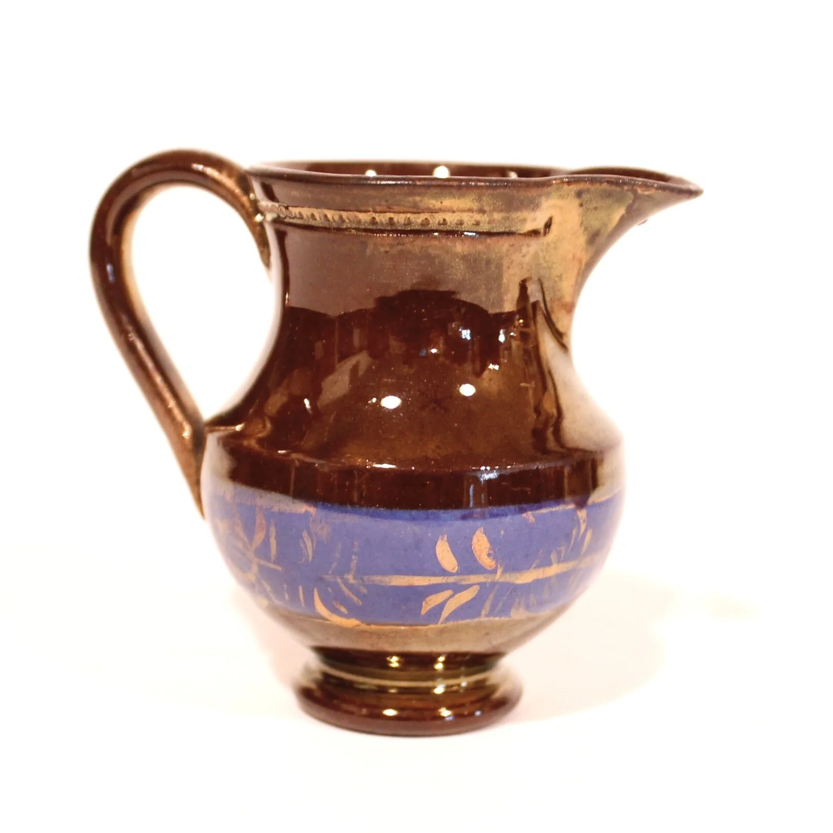 Pair of Small Dark Copper Lustre Ware Cream Pitchers