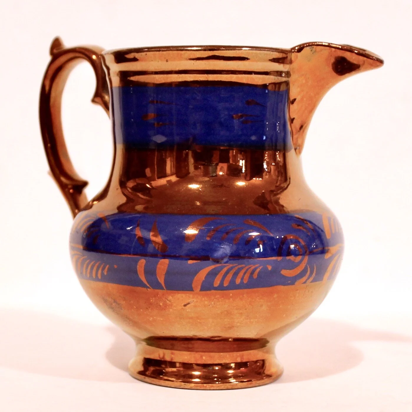 English Copper Lustre Ware Jug with Foliate Frieze on Blue