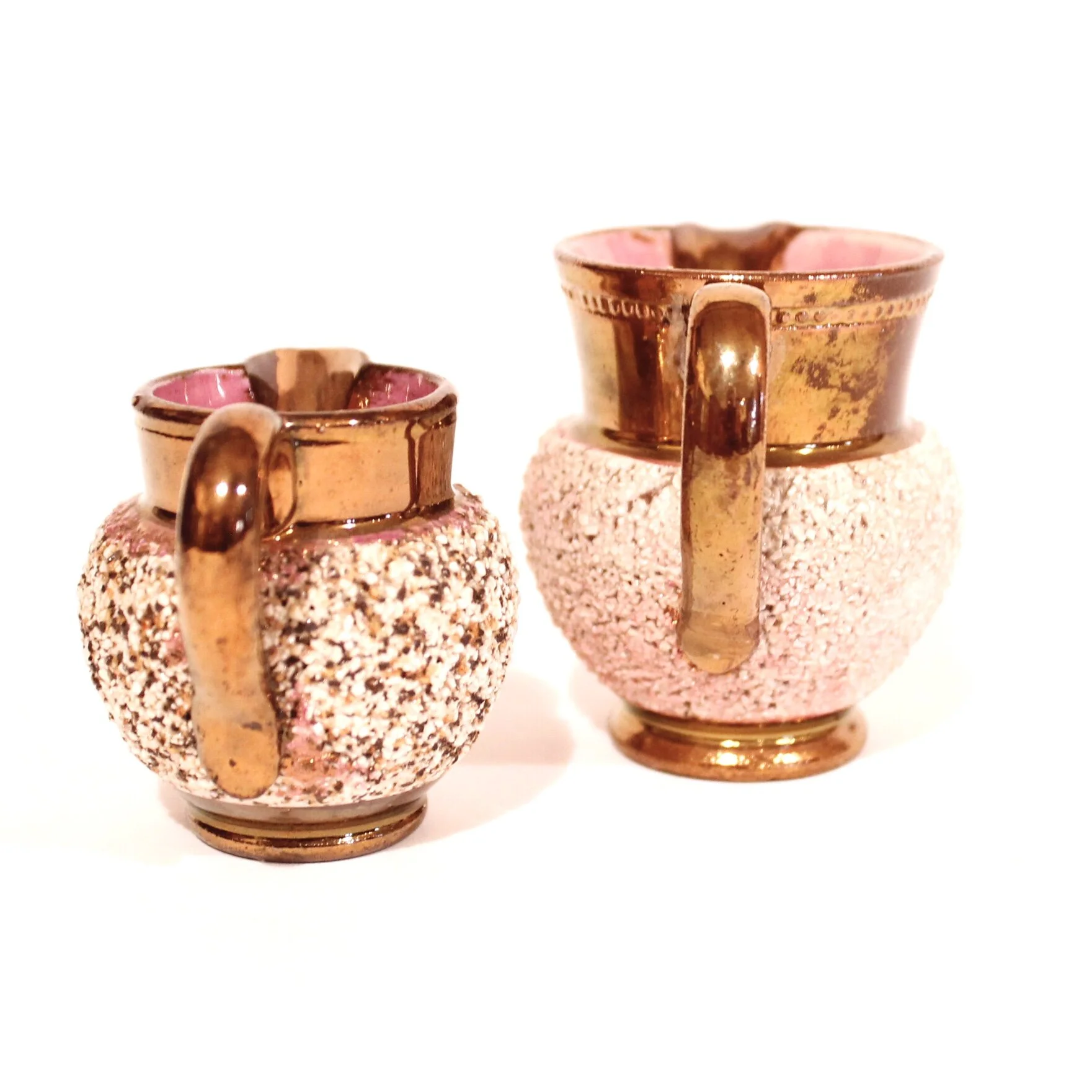 Pair of Miniature Copper Lustre Ware Cream Pitchers with Low Relief Textured Bodies