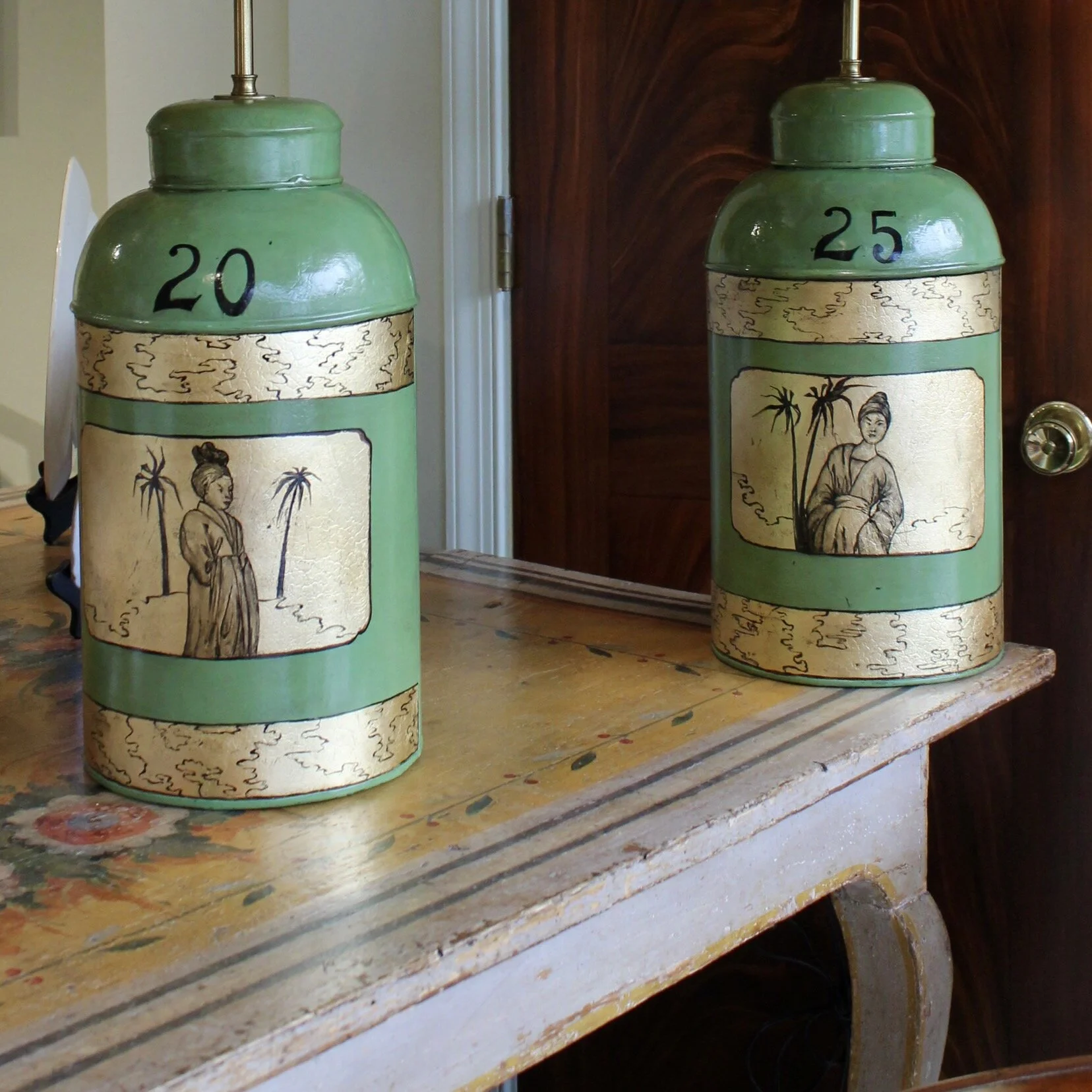 Pair of Green Painted and Gilt Decorated Tôle Tea Canister Lamps