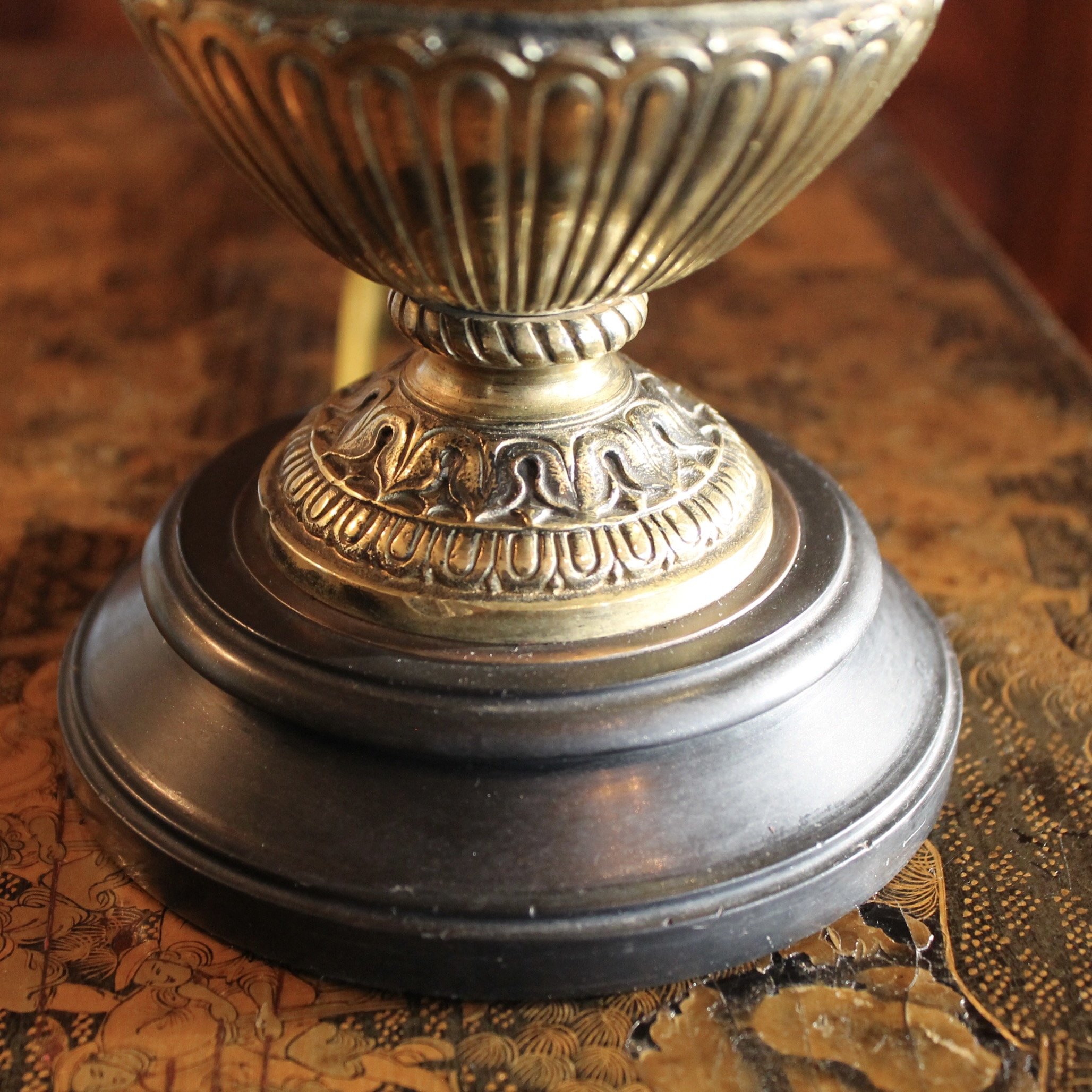 Pair of Polished Bronze Neoclassical Urn Lamps with Orange Linen Shades