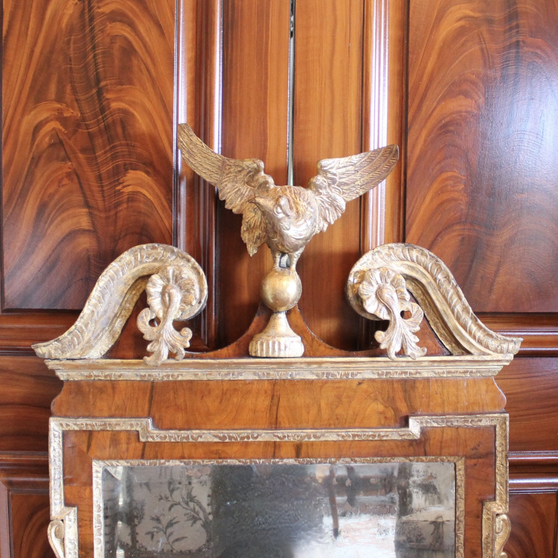 George II Period Scroll Pedimented Walnut and Giltwood Mirror with Eagle