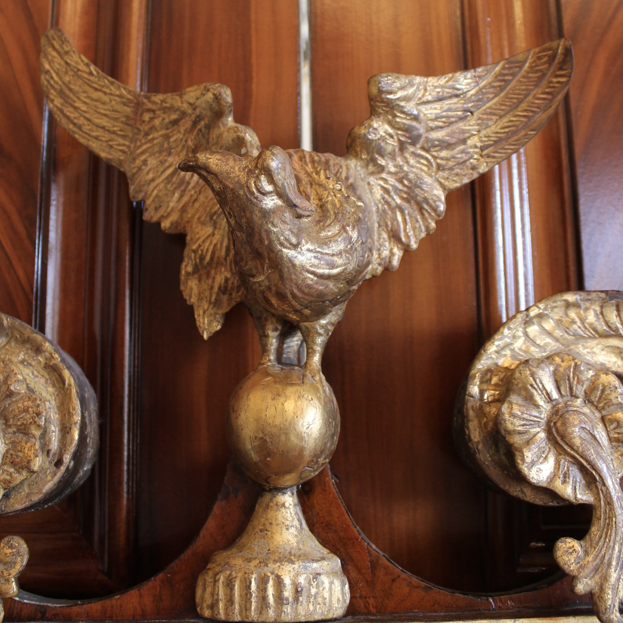 George II Period Scroll Pedimented Walnut and Giltwood Mirror with Eagle