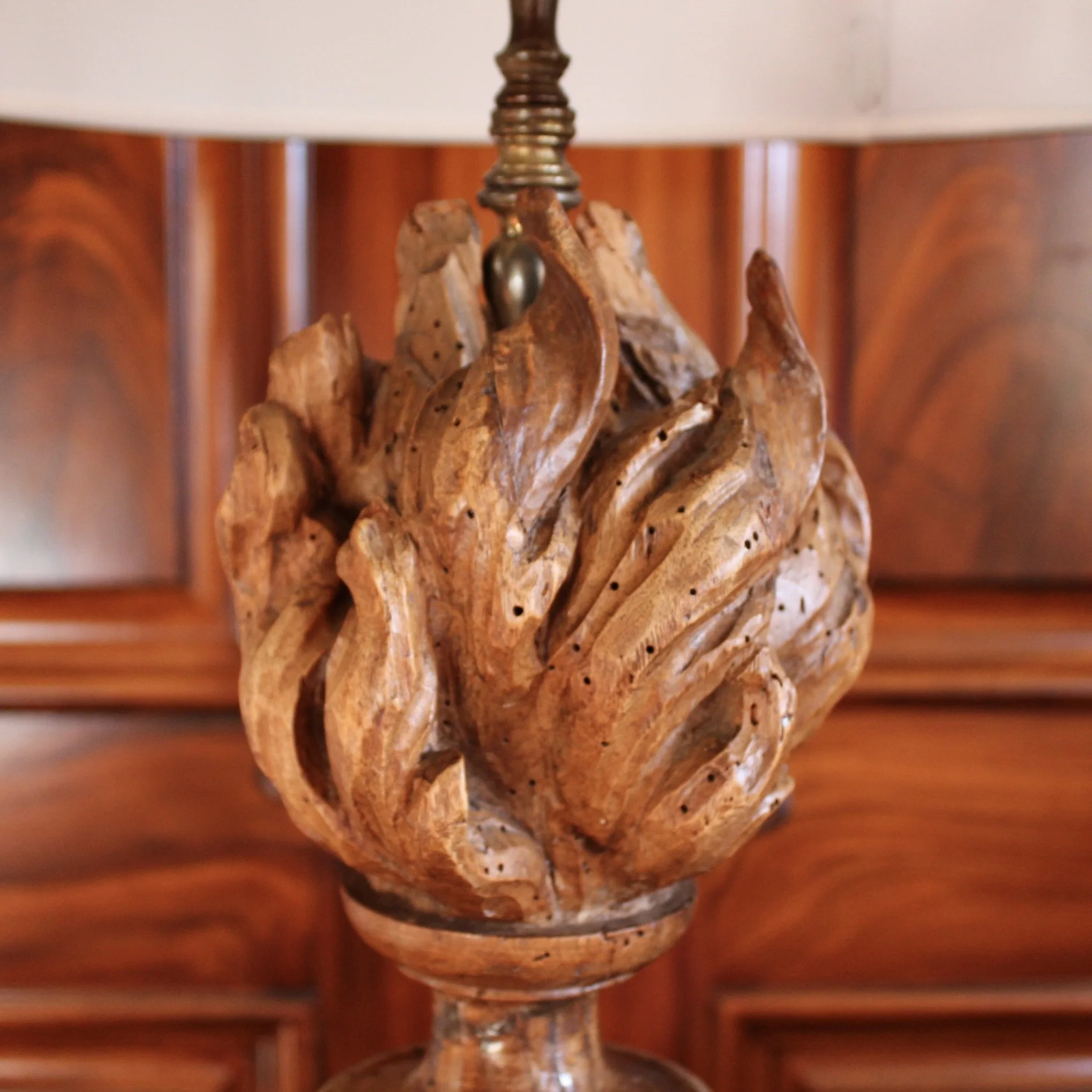 Antique carved flame lamp