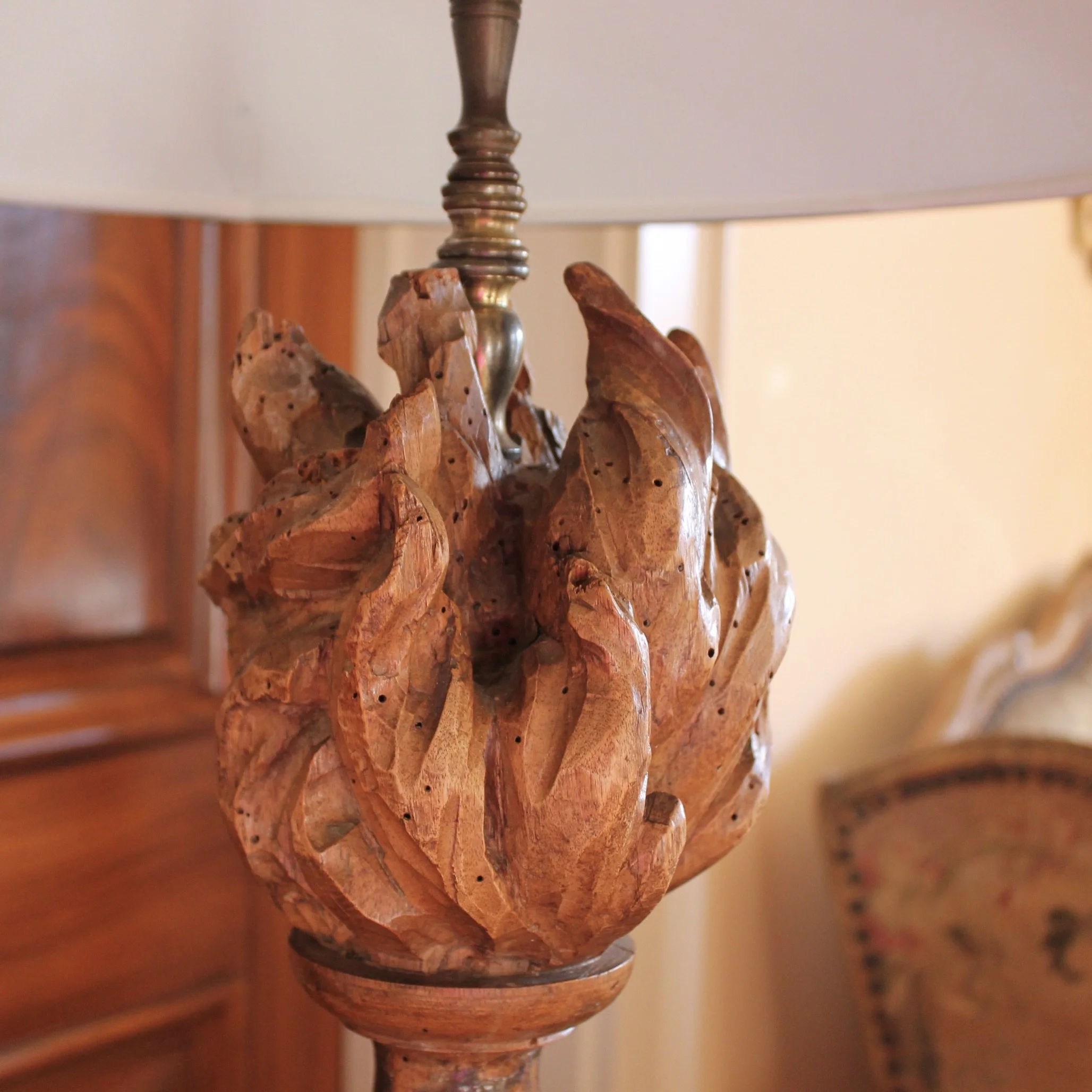 Antique carved flame lamp