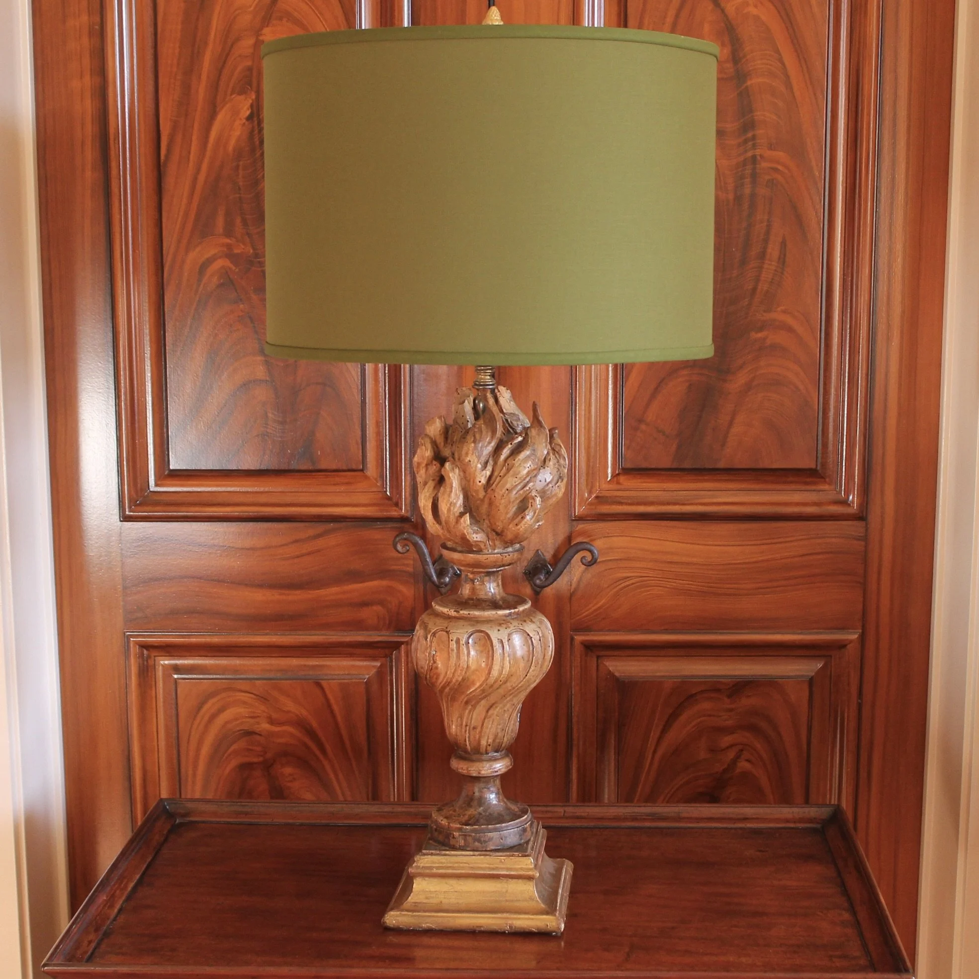 Antique carved flame lamp