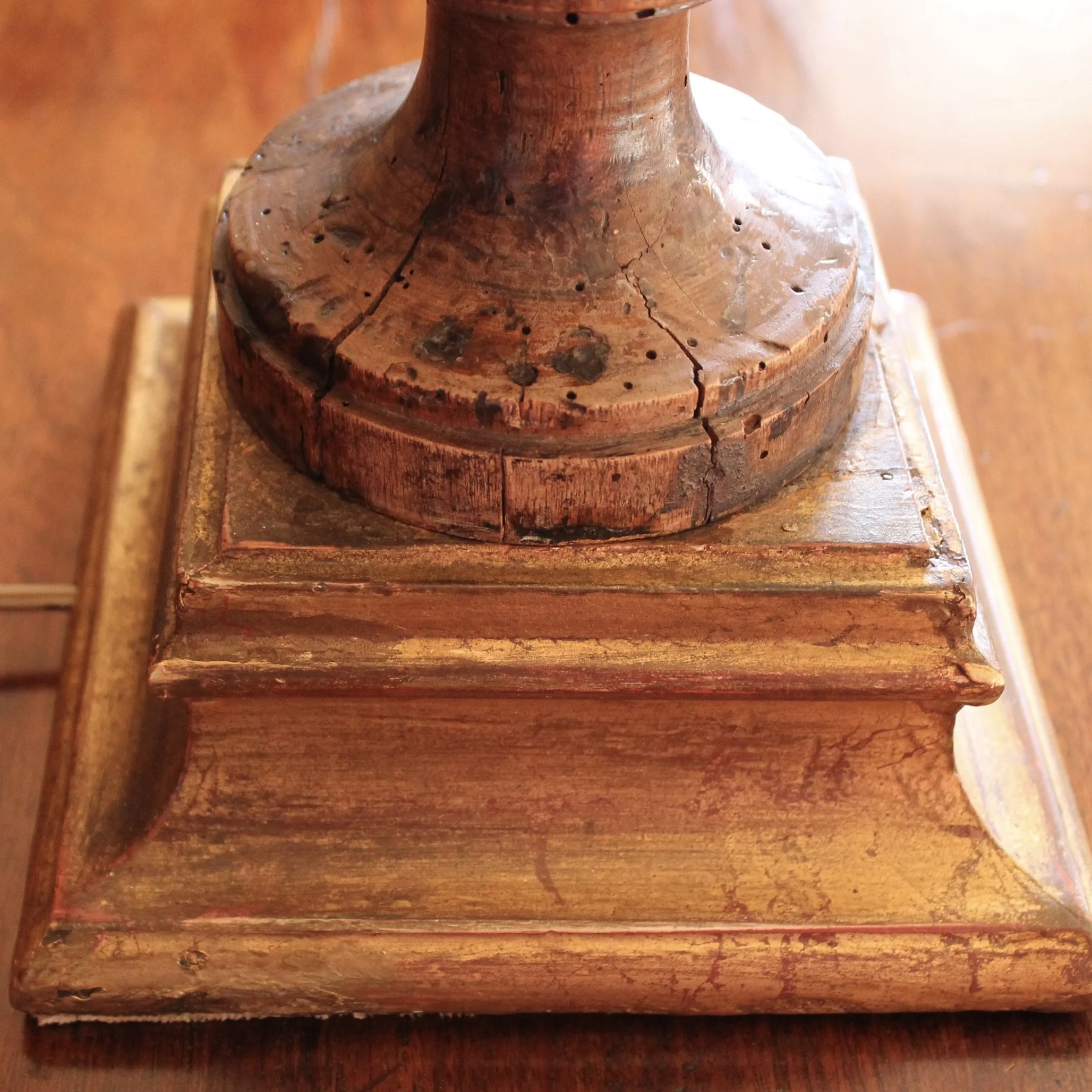 Antique carved flame lamp