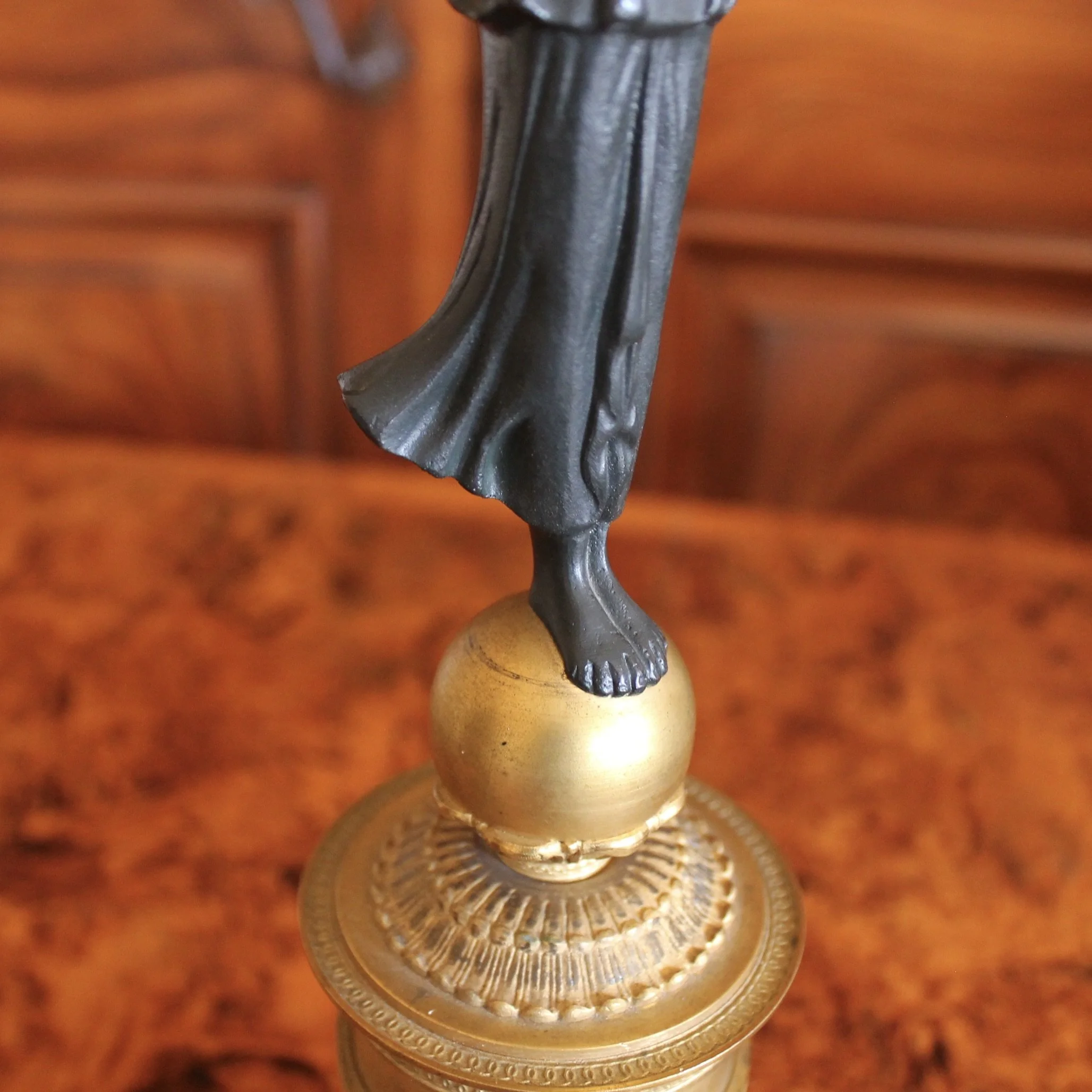 Pair of Continental Gilt Figural Neoclassical Candelabra