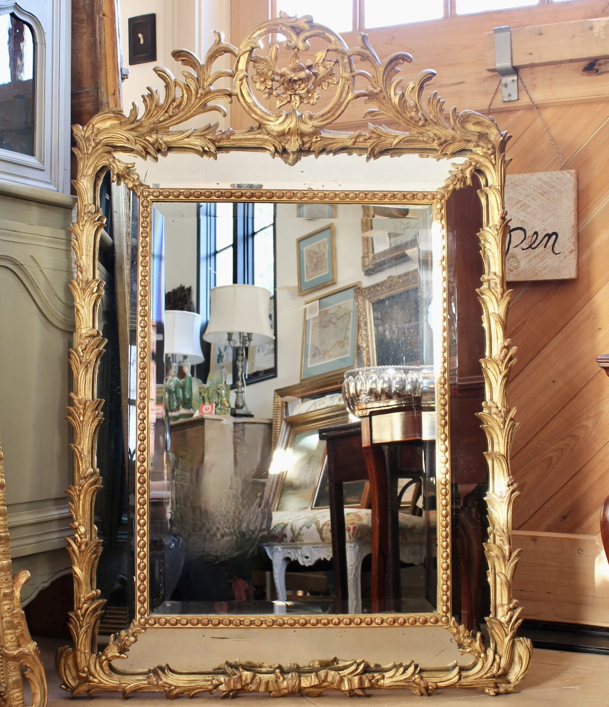 Large French Giltwood Rococo Carved Mirror with Palm Fronds
