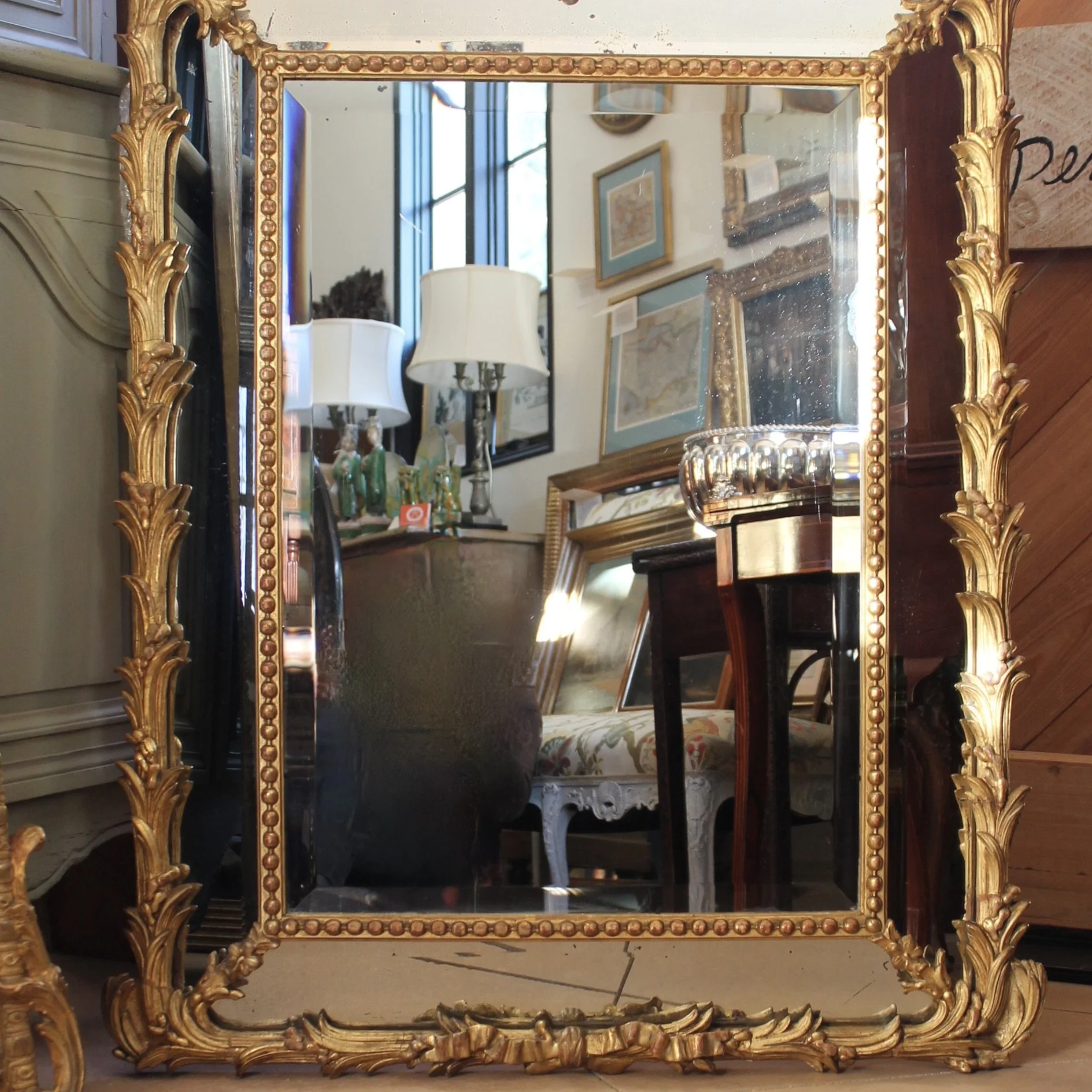 Large French Giltwood Rococo Carved Mirror with Palm Fronds