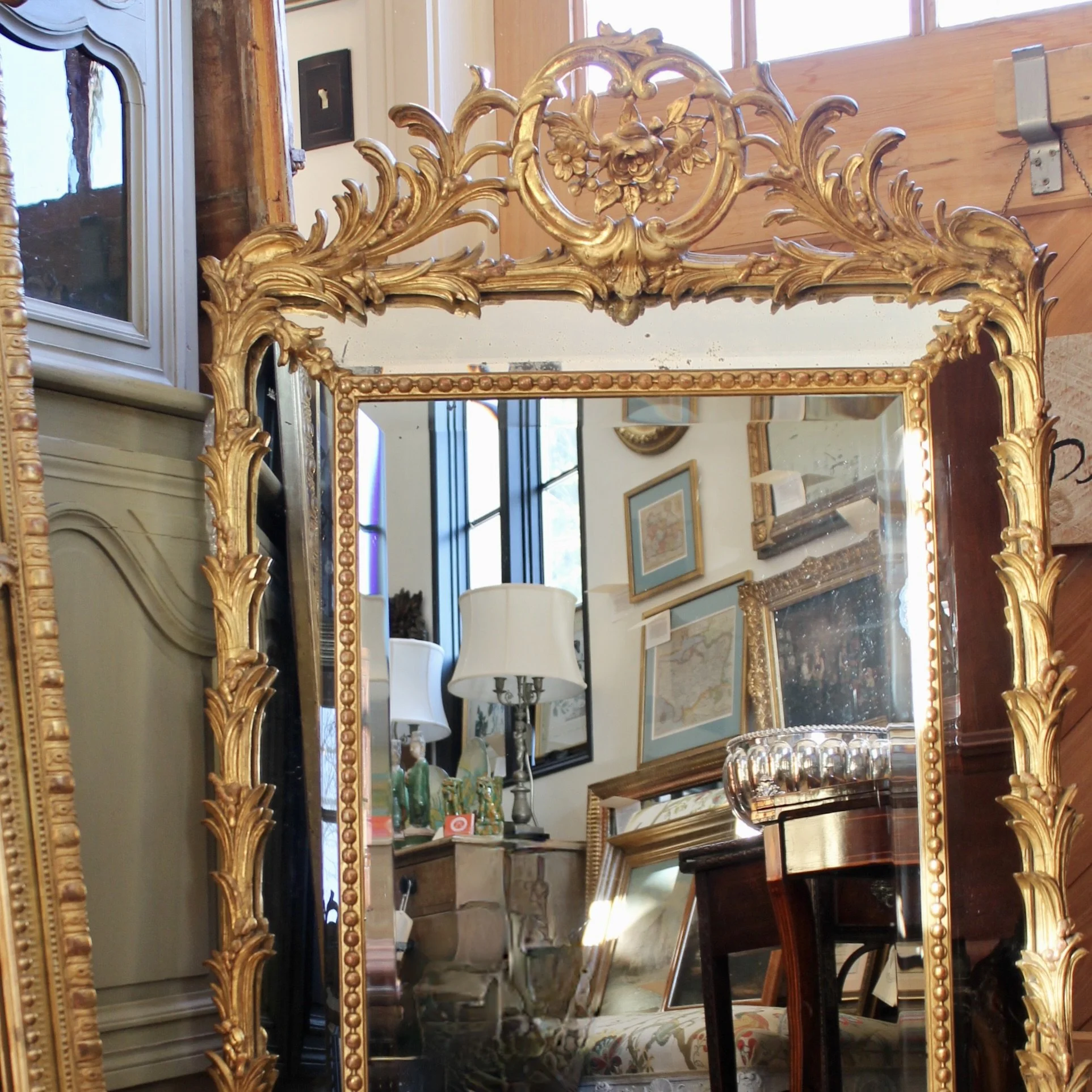 Large French Giltwood Rococo Carved Mirror with Palm Fronds