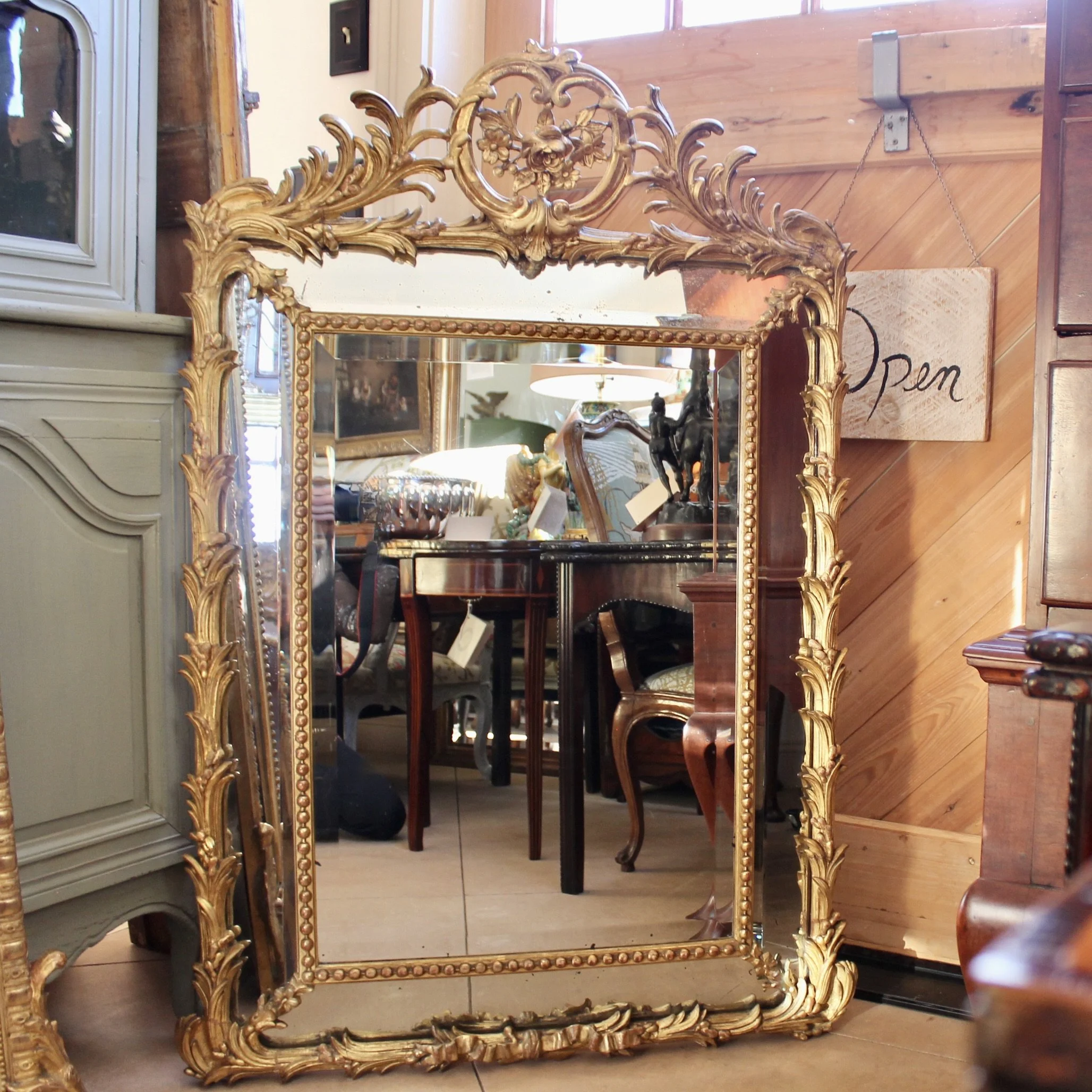 Large French Giltwood Rococo Carved Mirror with Palm Fronds