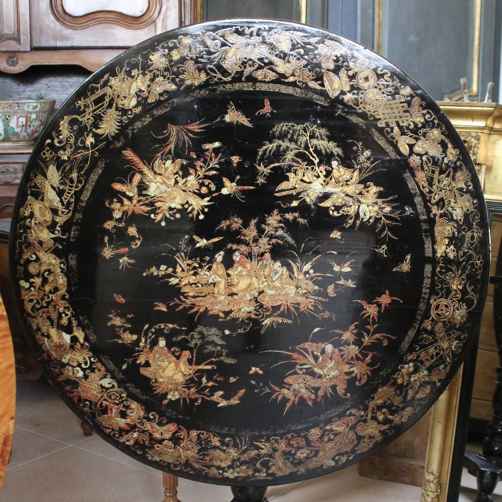 Chinese Export Black Lacquer and Gilt Decorated Tilt Top Table