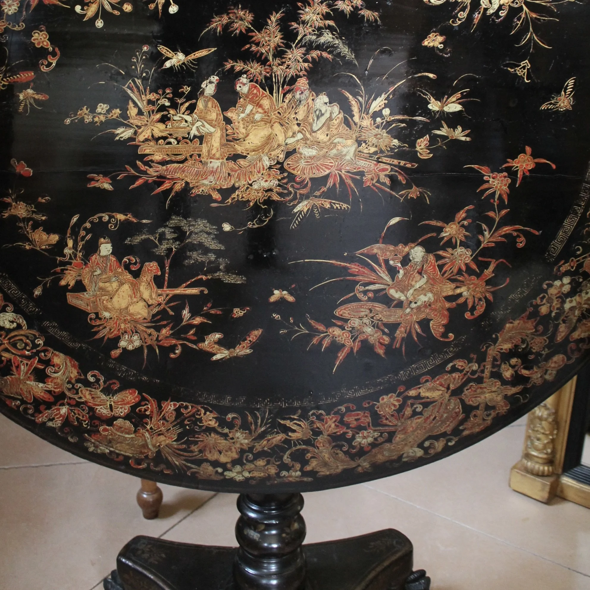 Chinese Export Black Lacquer and Gilt Decorated Tilt Top Table