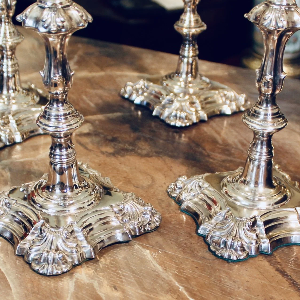 Set of Four George II Style English Silver Plate Candlesticks