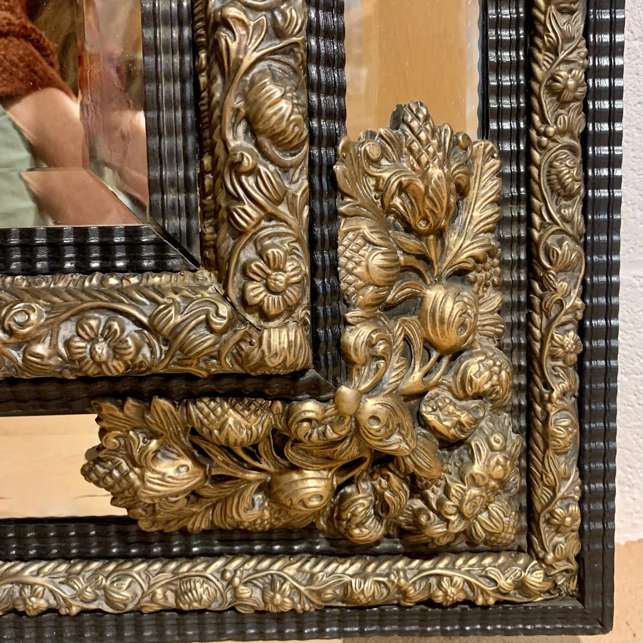 Large-Continental-Brass Repoussé-and-Ebonized-Crested-Cushion-Mirror (7)-detail