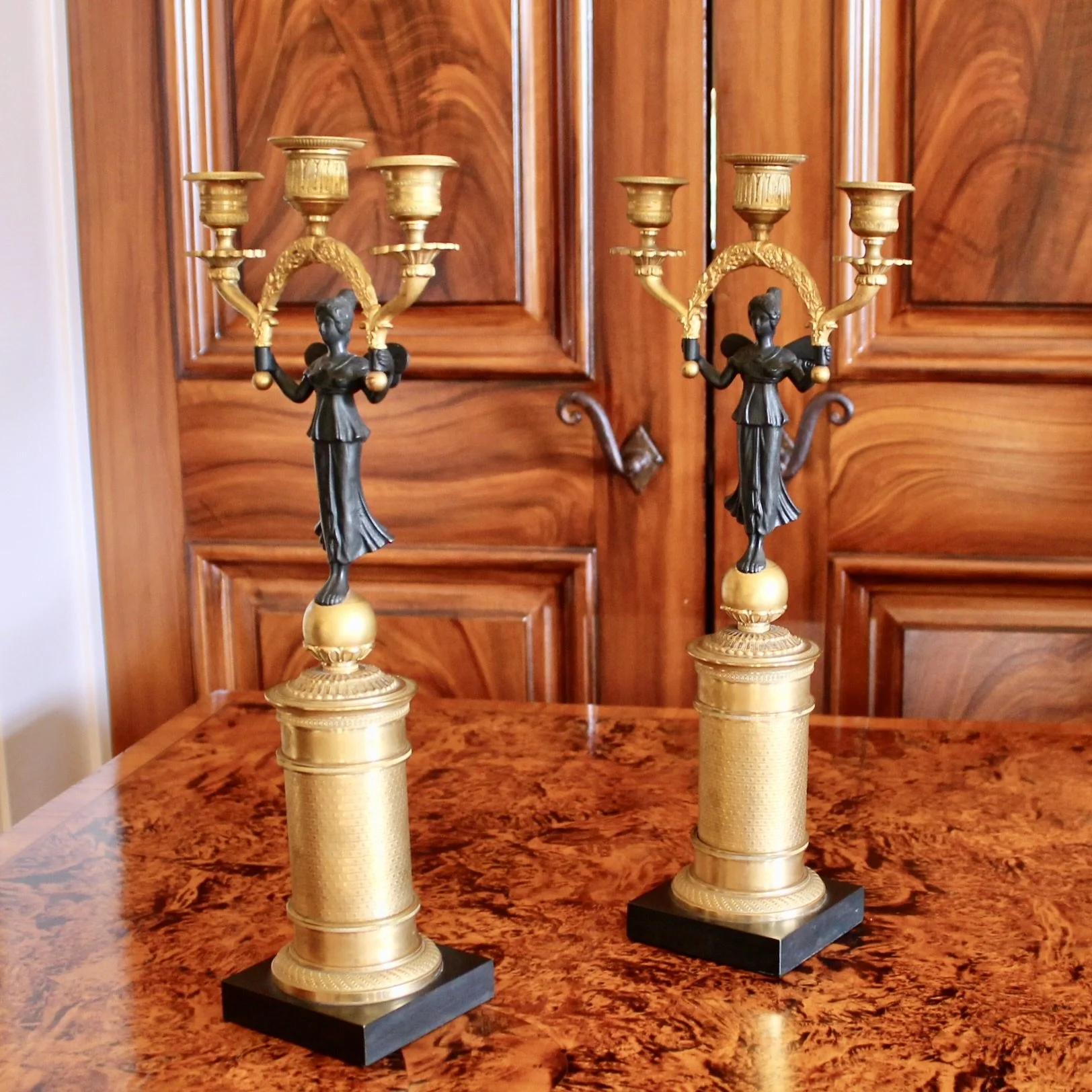 Pair of Continental Gilt Figural Neoclassical Candelabra