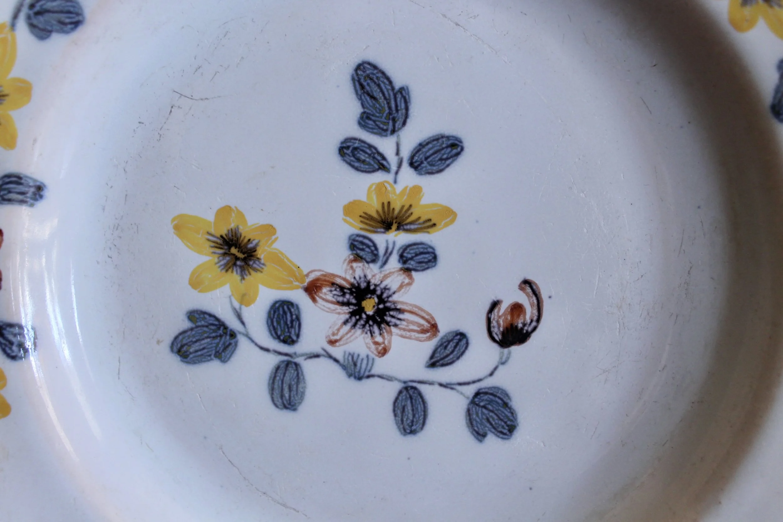 English Delftware Plate, Yellow and Lavender, 18th c.