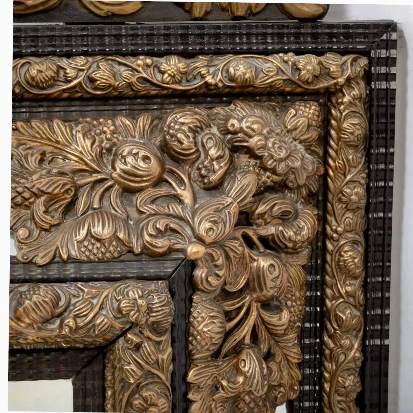 Large-Continental-Brass Repoussé-and-Ebonized-Crested-Cushion-Mirror (4)-corner