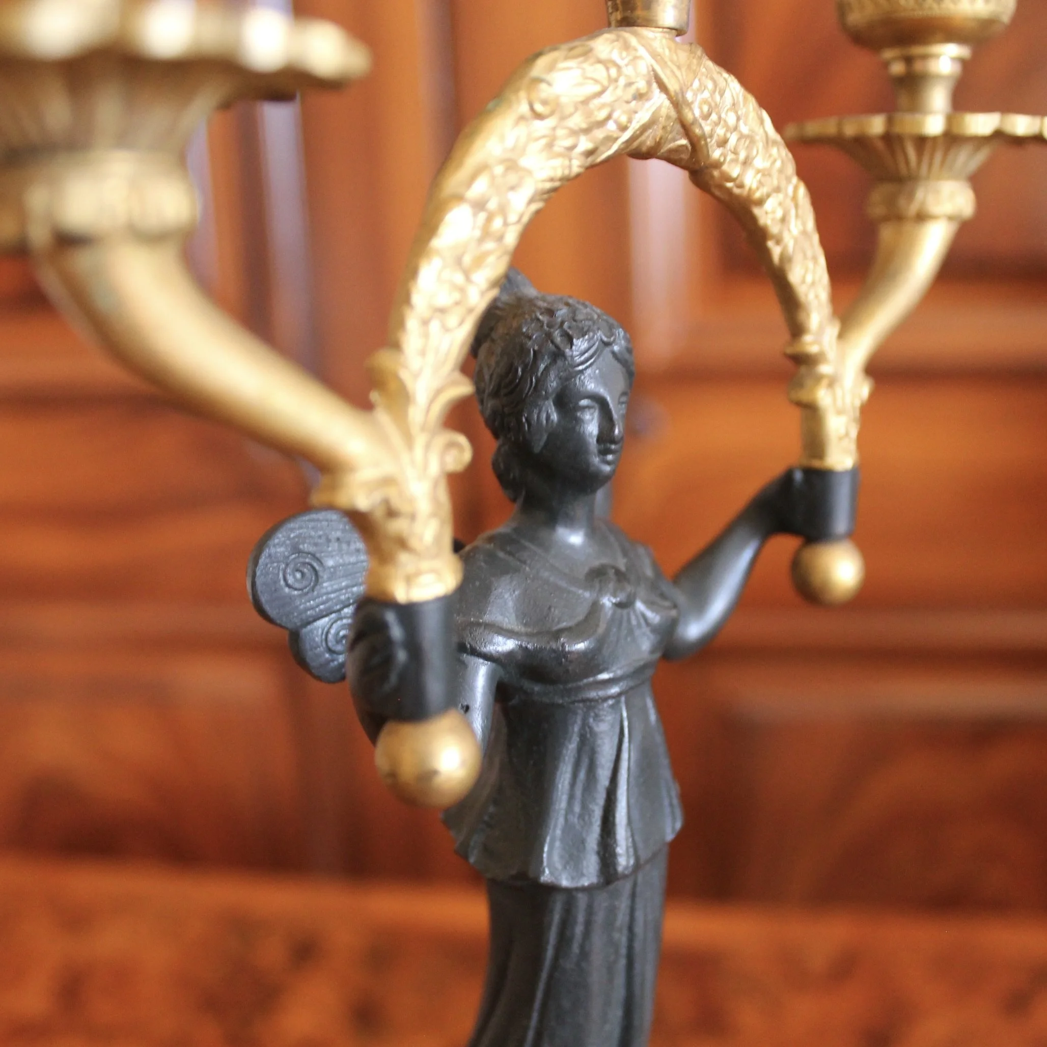 Pair of Continental Gilt Figural Neoclassical Candelabra