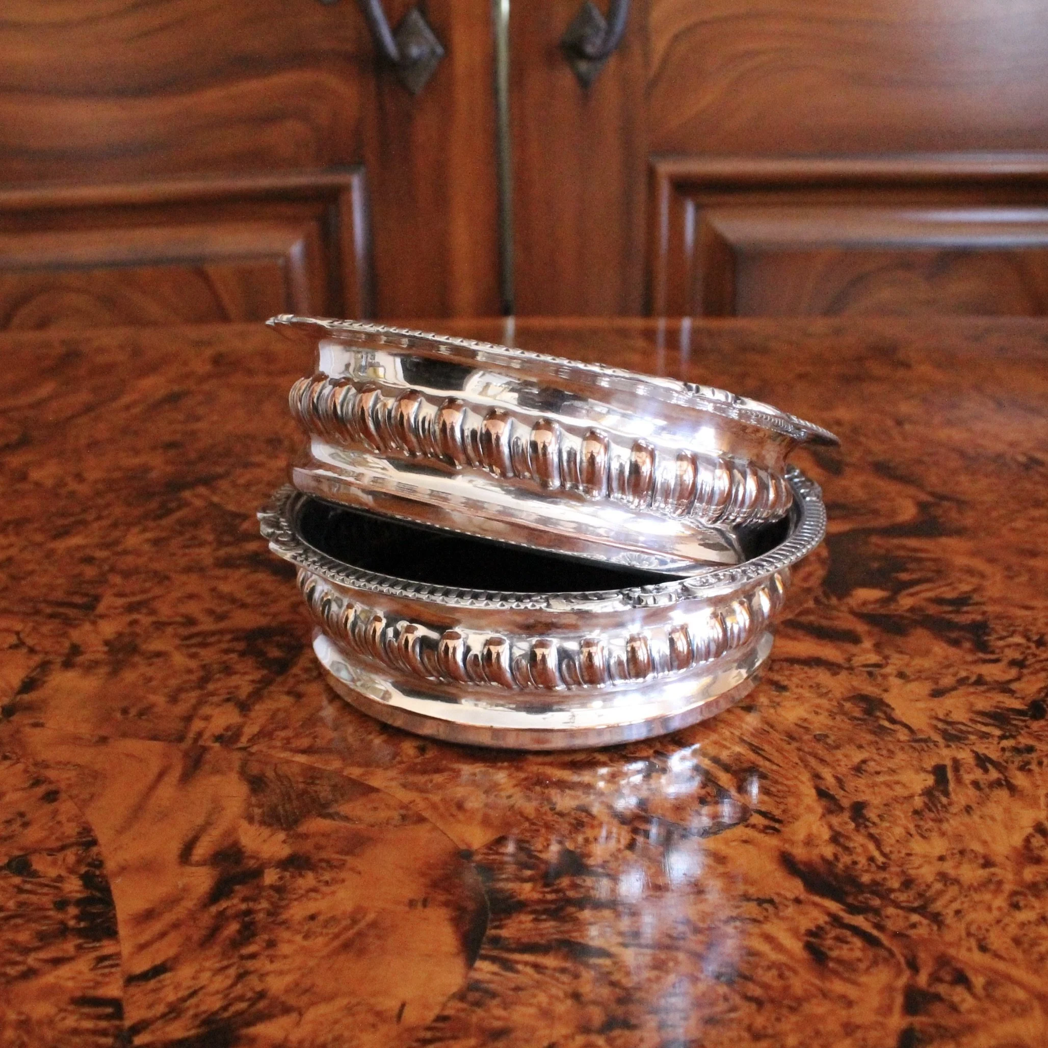 English Silver on Copper Gadrooned Wine Bottle Coasters, pair