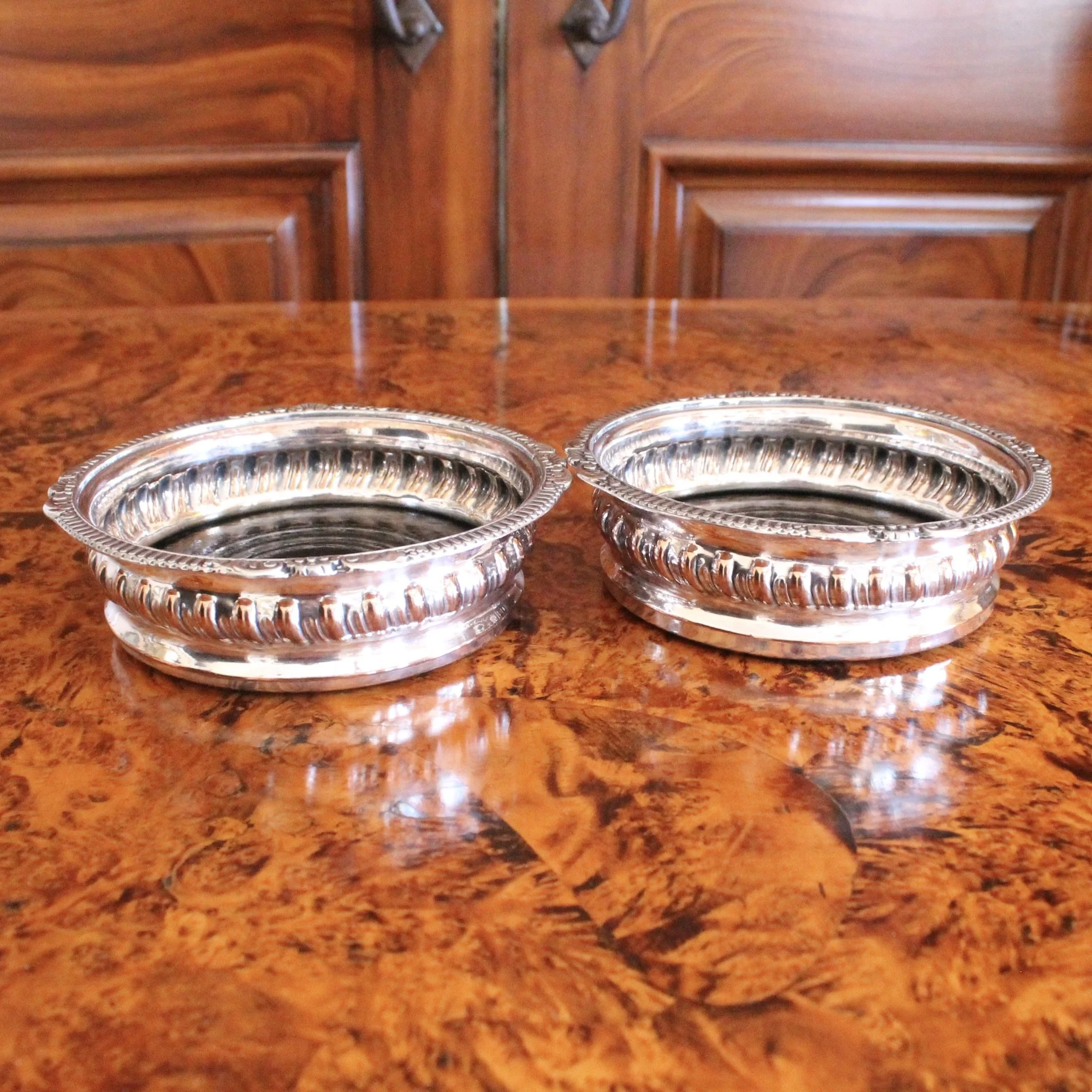 English Silver on Copper Gadrooned Wine Bottle Coasters, pair
