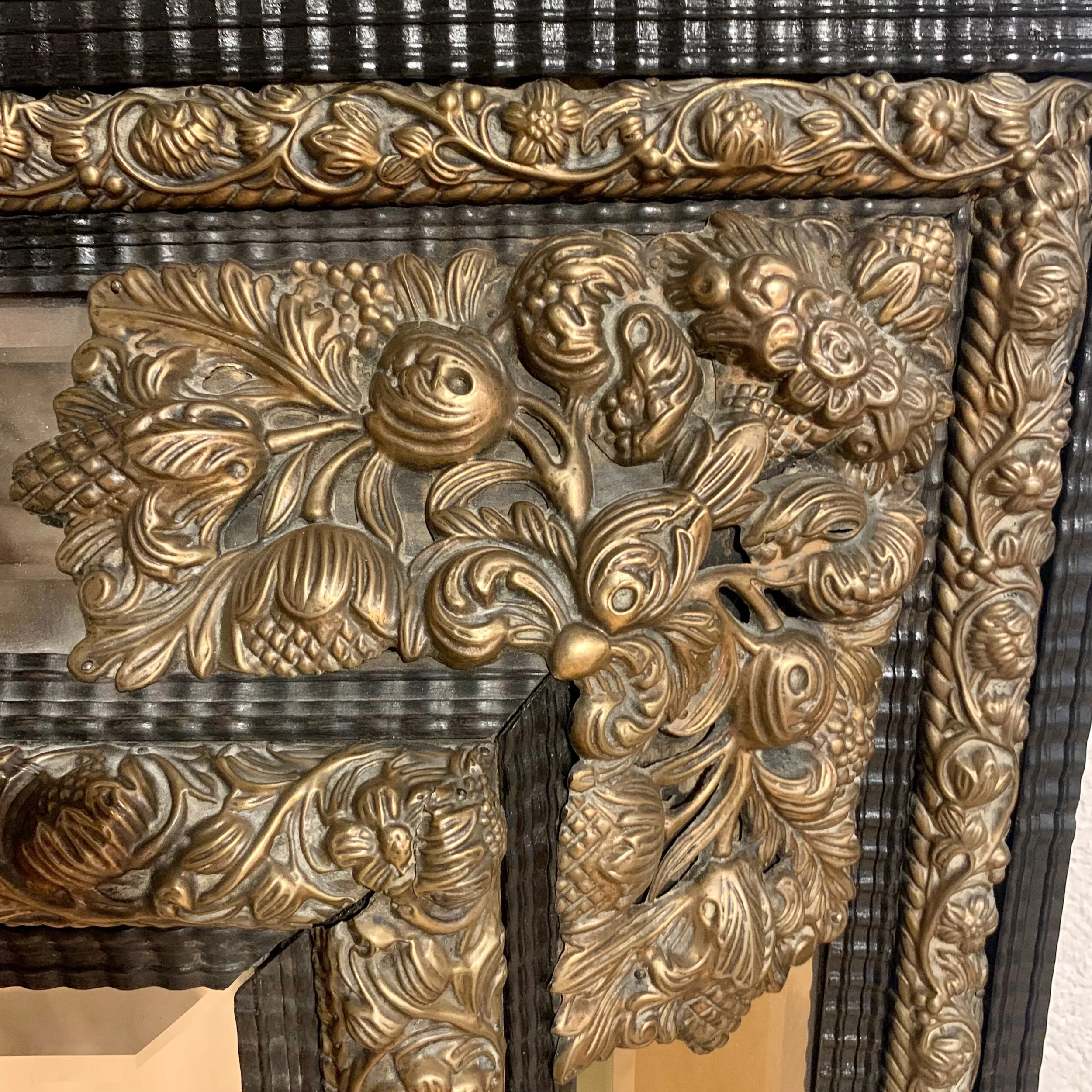 Large-Continental-Brass Repoussé-and-Ebonized-Crested-Cushion-Mirror (5)