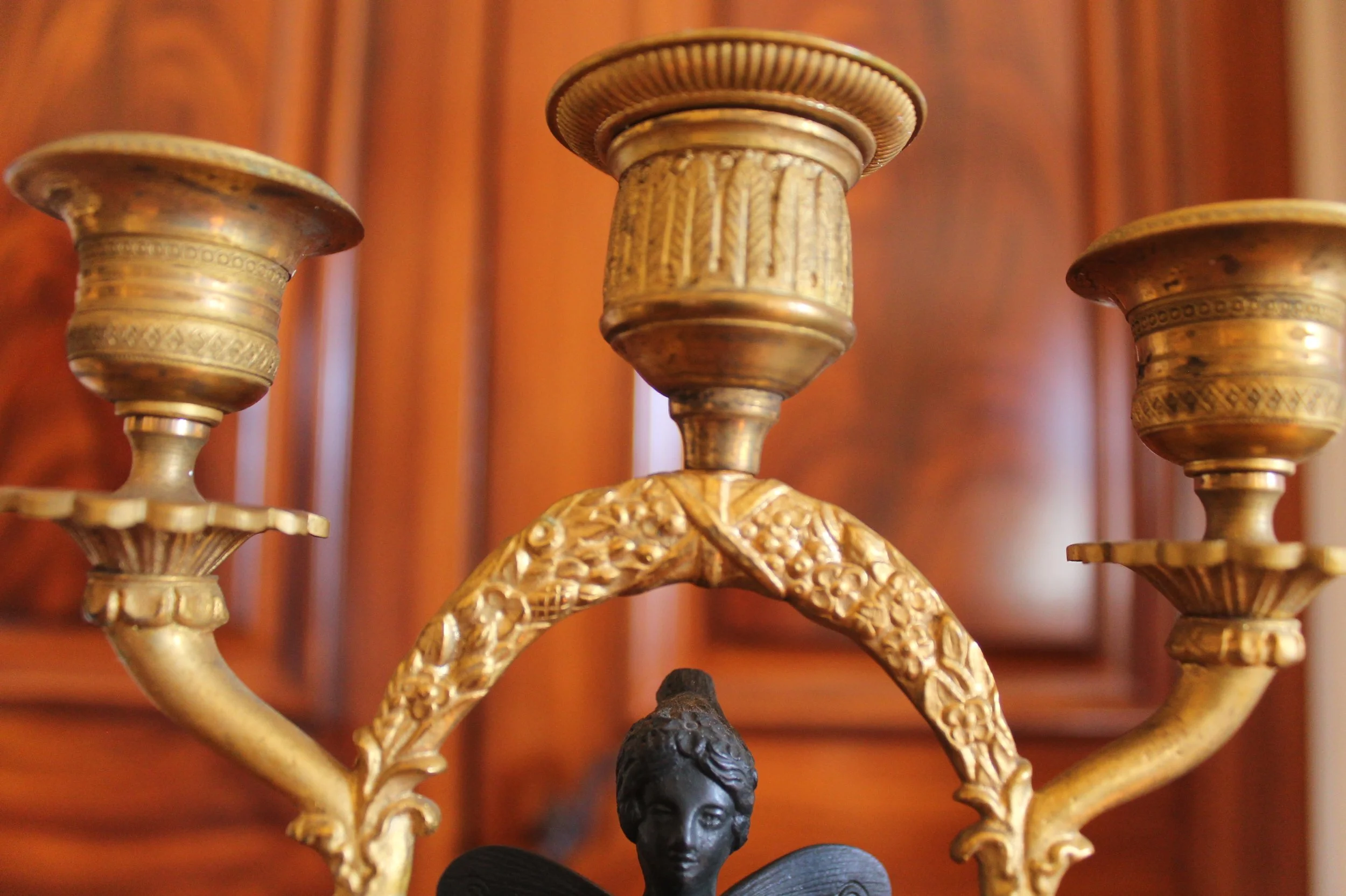 Pair of Continental Gilt Figural Neoclassical Candelabra