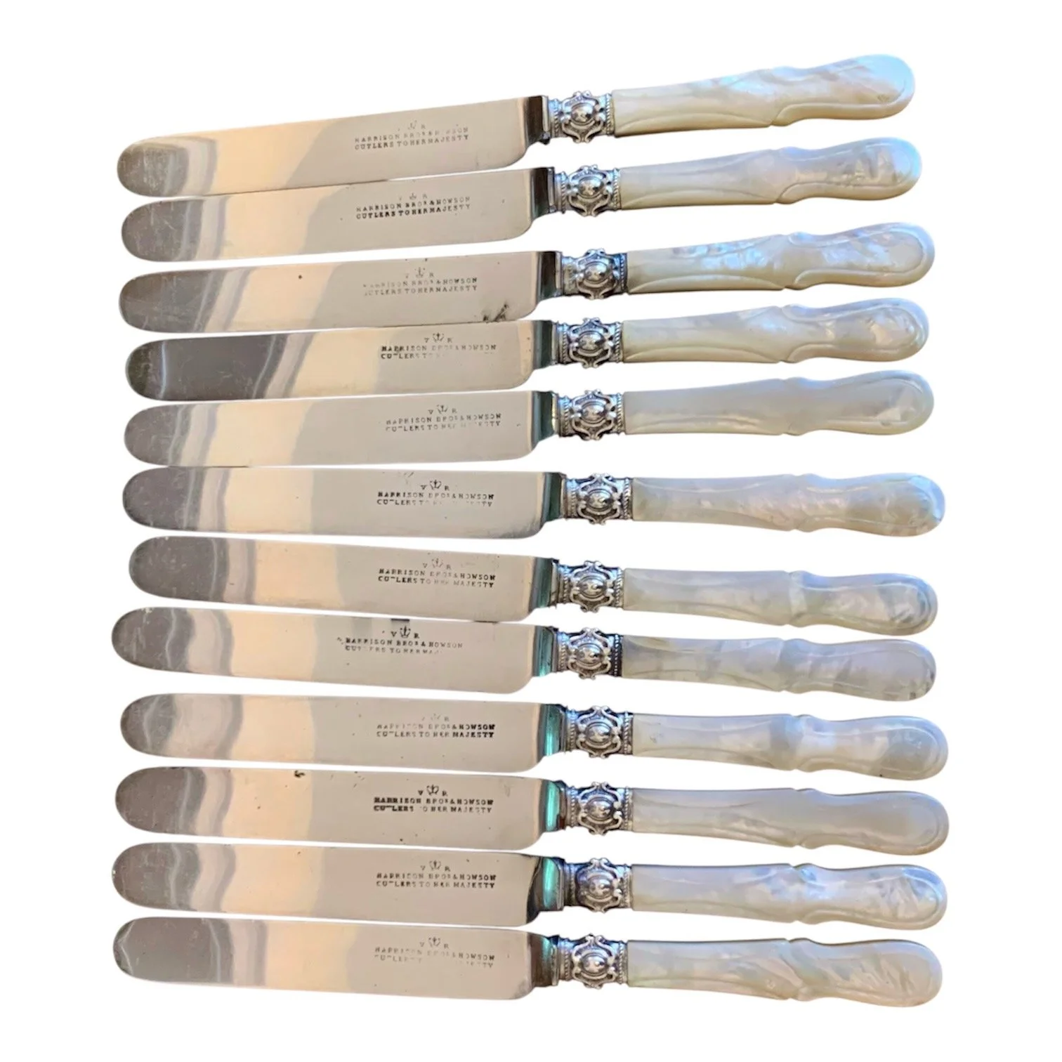 Harrison-Bros.-&-Howson-English-Silver-&-Mother-of-Pearl-Knives-set-of-12.jpeg