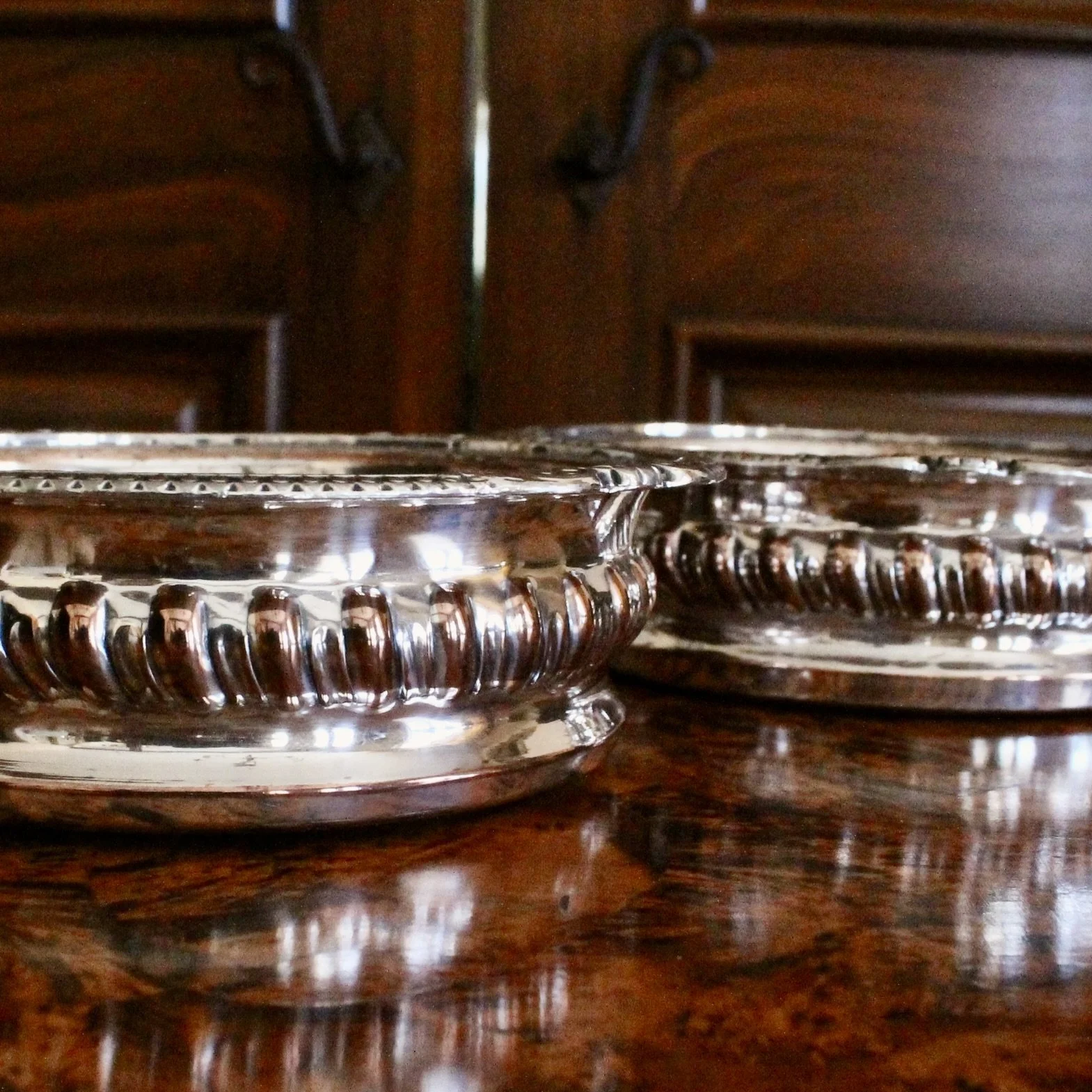 English Silver on Copper Gadrooned Wine Bottle Coasters, pair