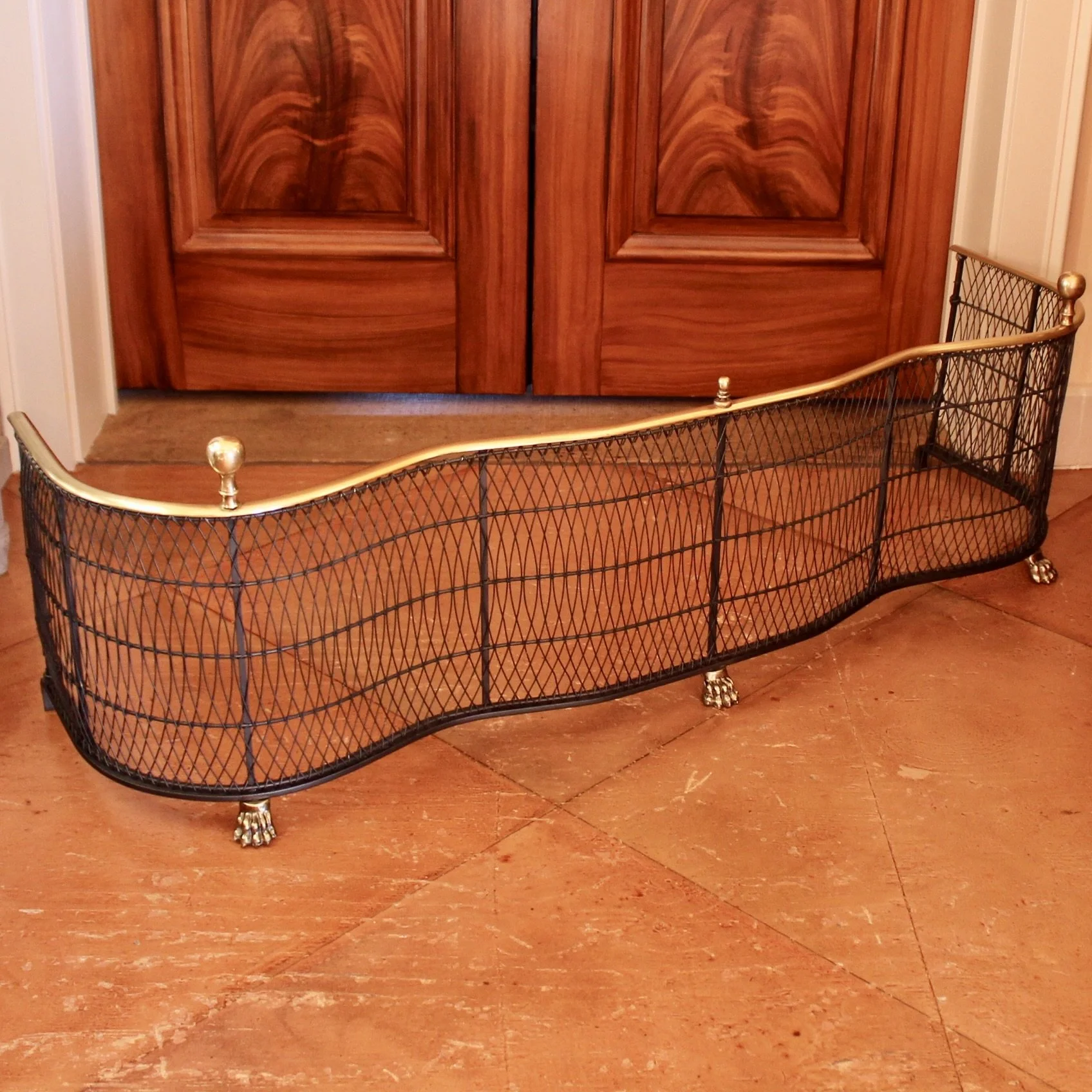 Brass Bound Wirework Serpentine Fender on Brass Paw Feet