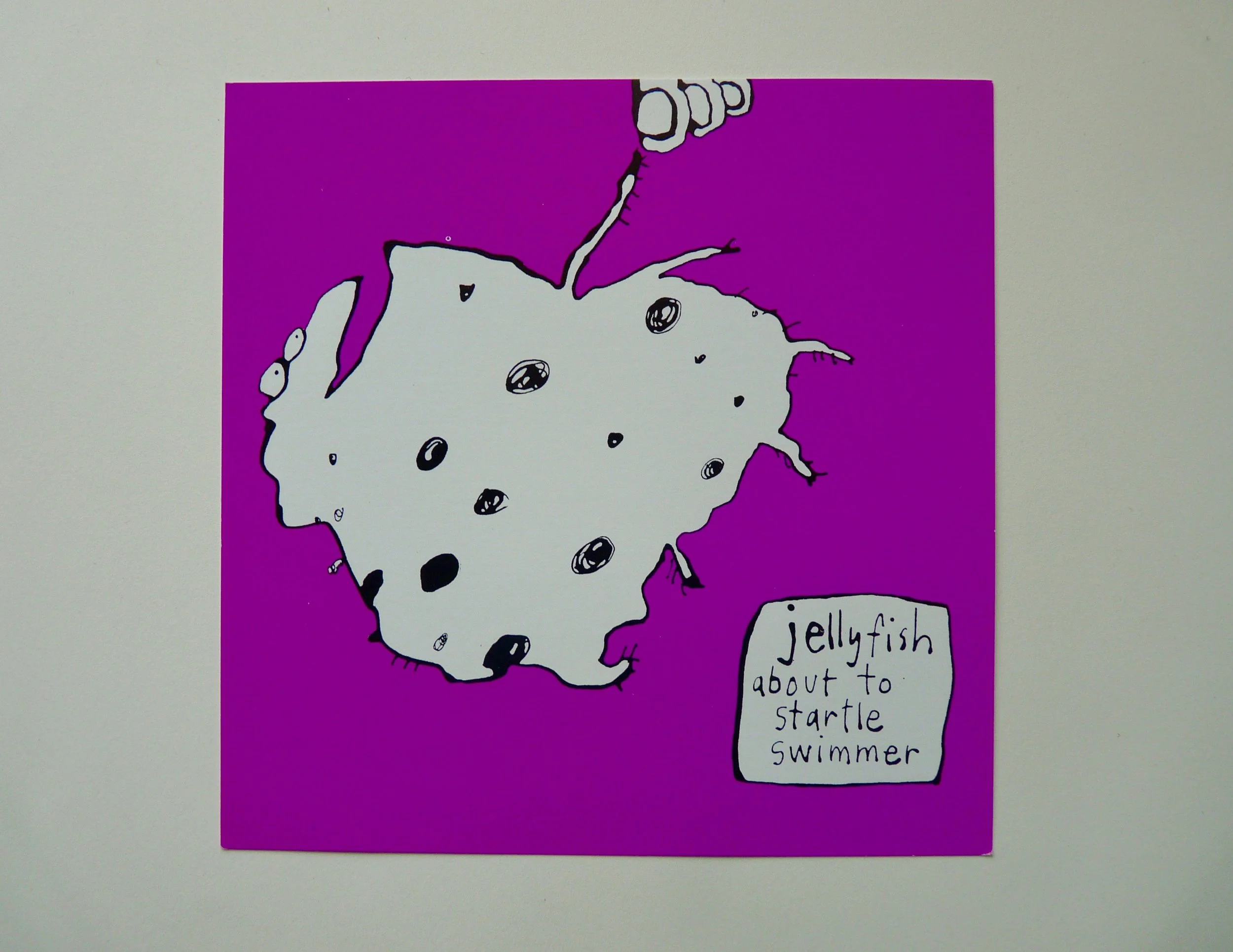 jellyfish about to startle swimmer