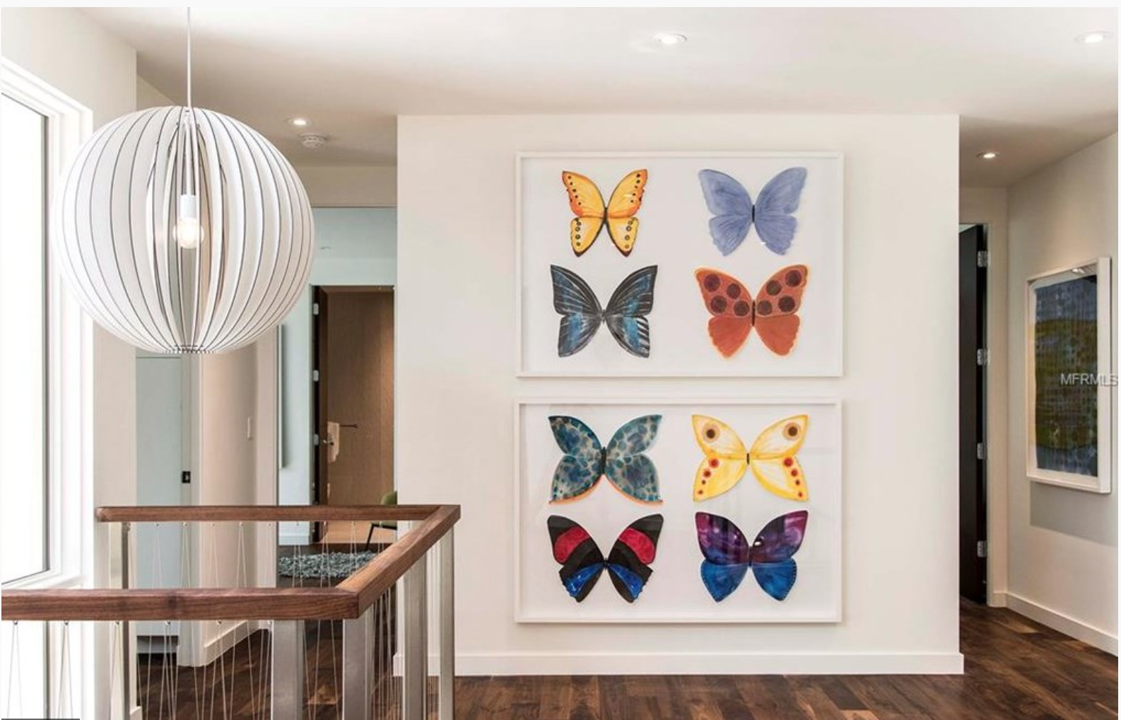Second Floor balcony wall: "8 Butterflies" Handpainted, hand-cut 3-dimensional paper butterflies framed in the likeness of specimen boxes. $7995. for the pair.