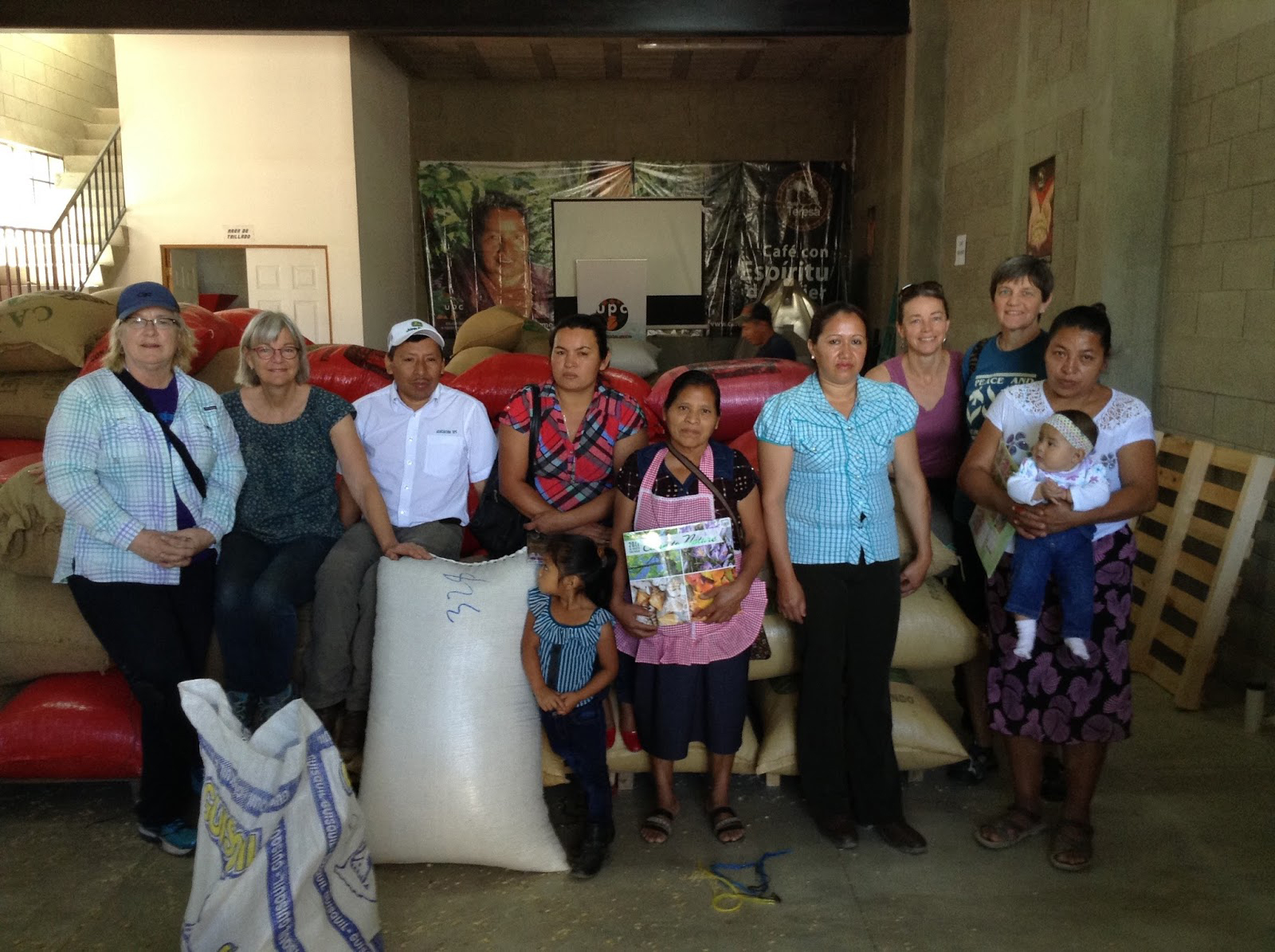 With the bags of coffee: Brenda, Jody, Jacinto, Orfa,Fabiana, Sonia, Sue, Donna, Maria Luz