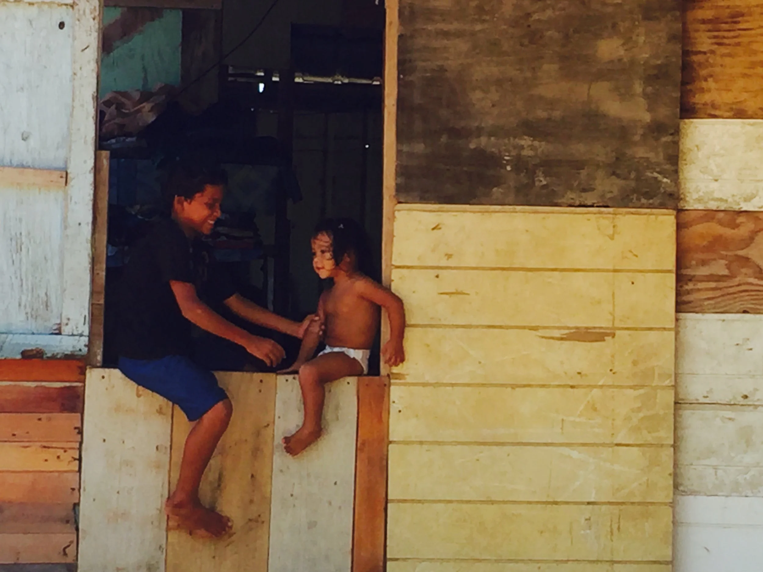 Brother and sister in Placentia, Belize
